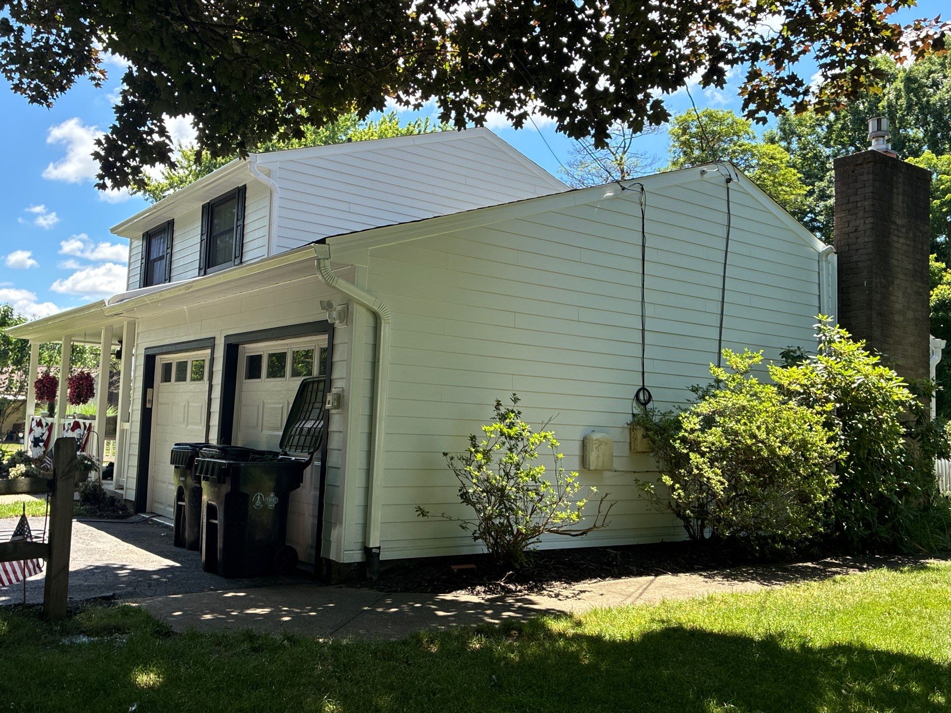 Vinyl Siding to James Hardie Arctic White with Midnight Black Trim by Ideal Siding Pittsburgh