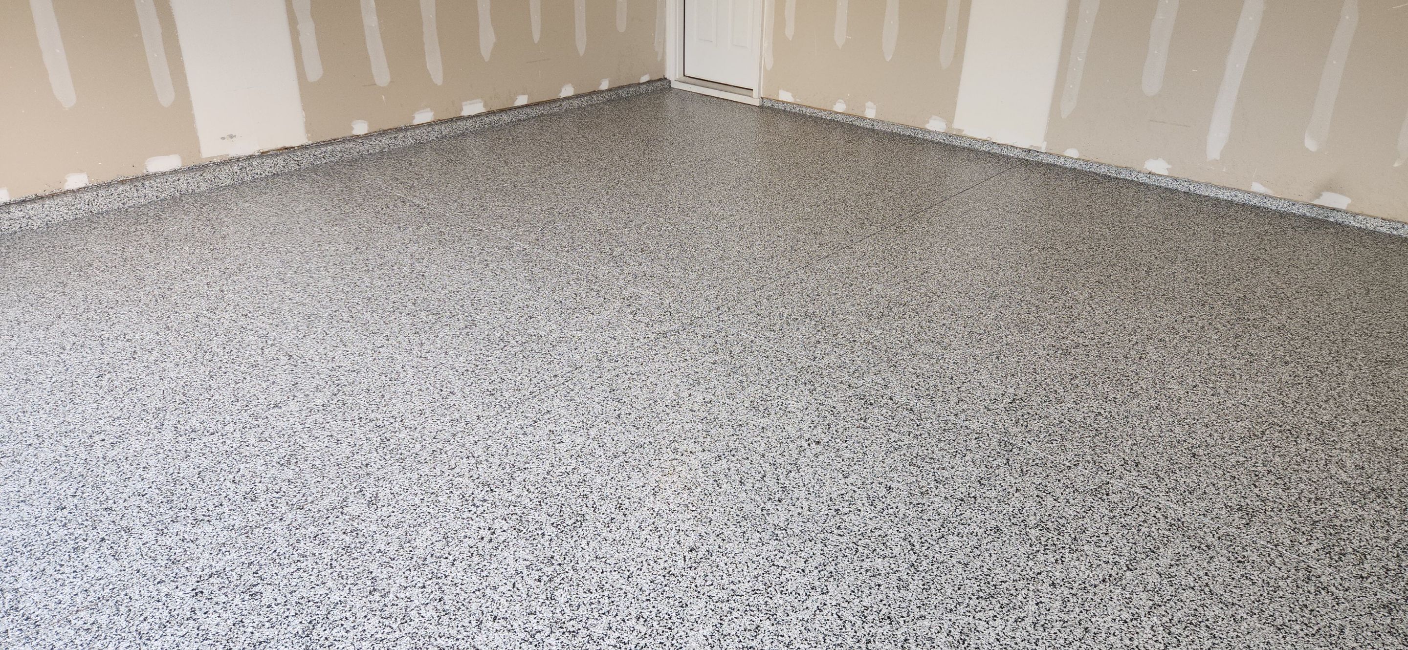 Garage & Back Patio using Domino & Pumice by Elite Floor Solutions