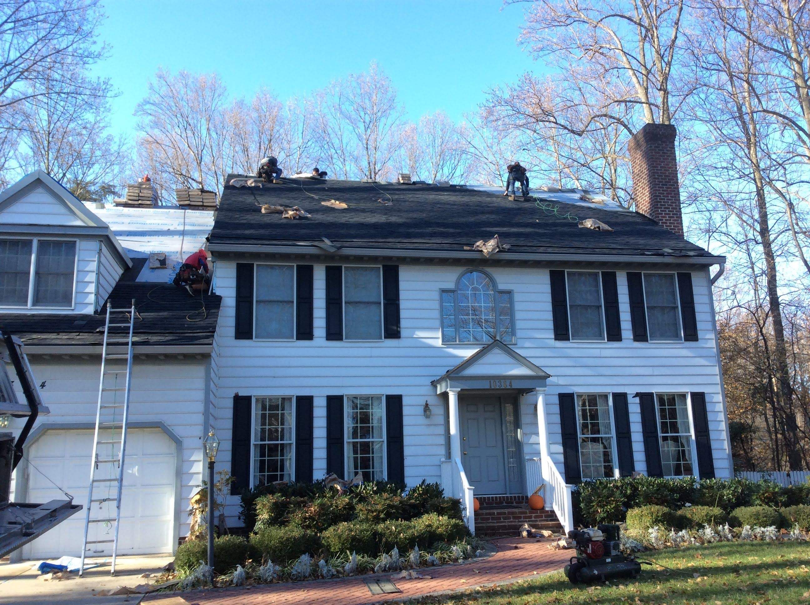 Residential Roofing Installation using Charcoal Black by Alpha Design Services