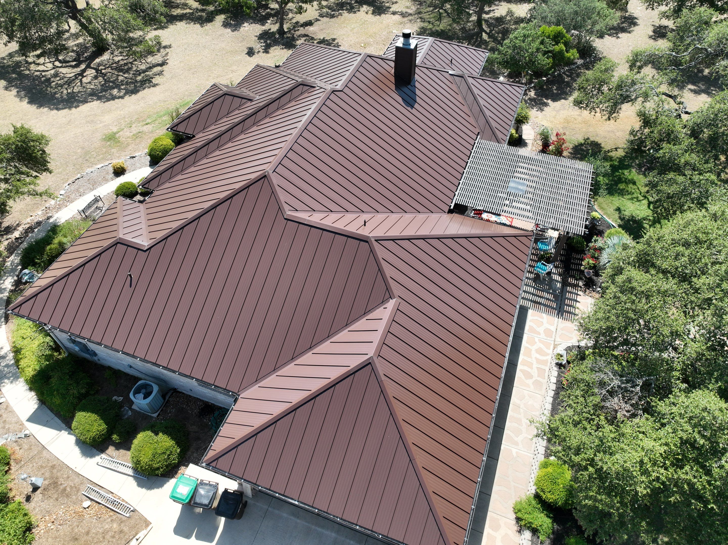 Residential Metal Roof Installation using McElroy Metal by Premier Roofing and Contracting