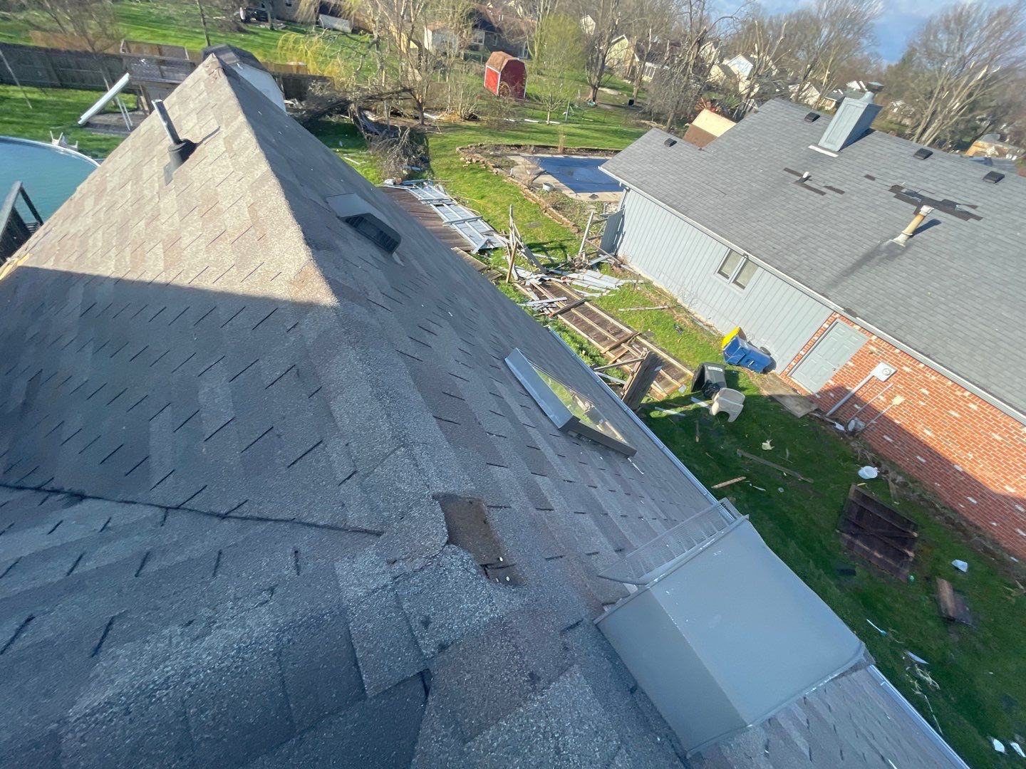 Tornado damage in Whiteland. Roof replacement, James Hardie siding, exterior paint, gutters, windows, doors by 317 Roofing & Restorations