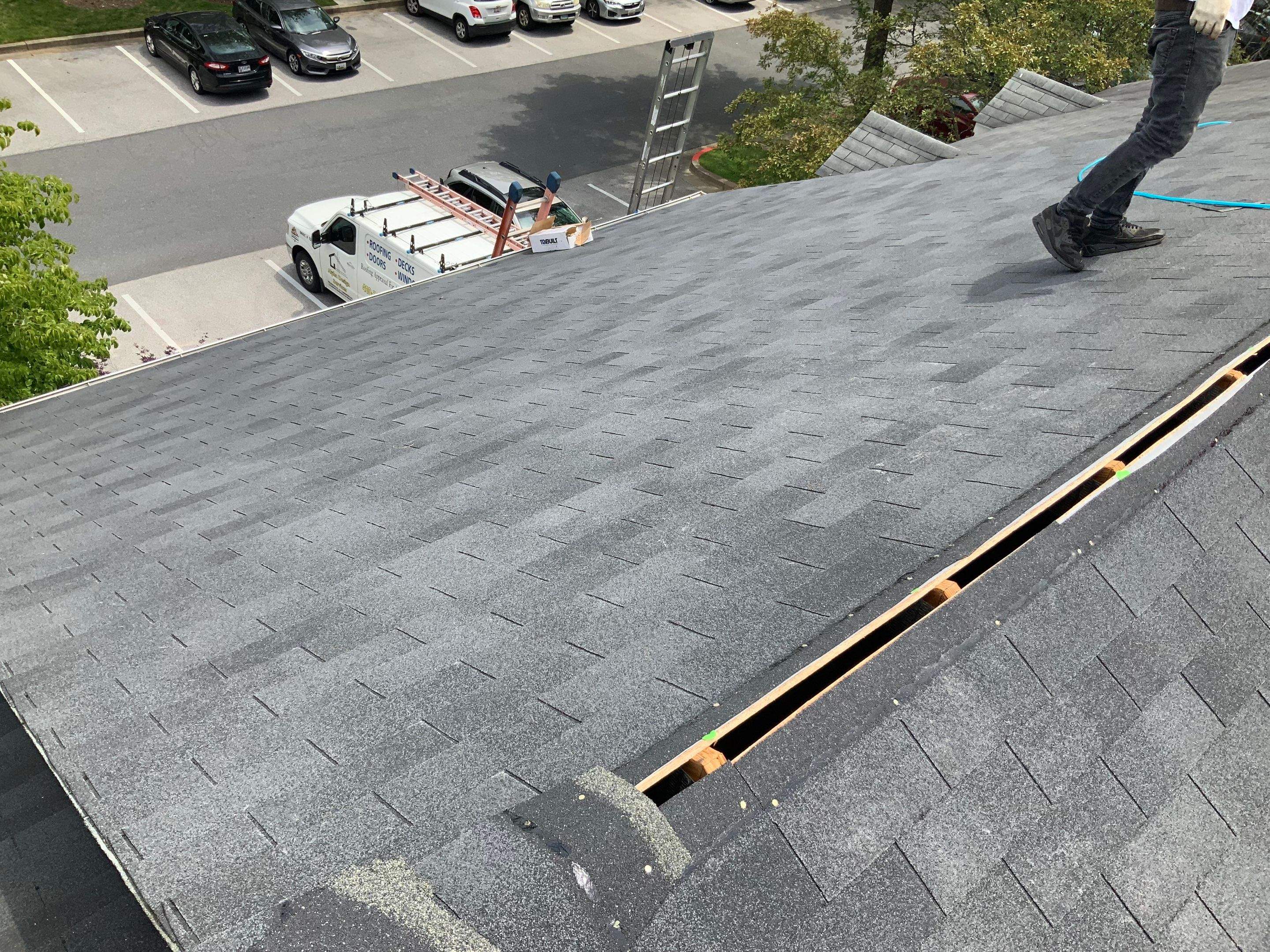 Residential Roofing Installation using XT-25 Color Moire Black by Alpha Design Services