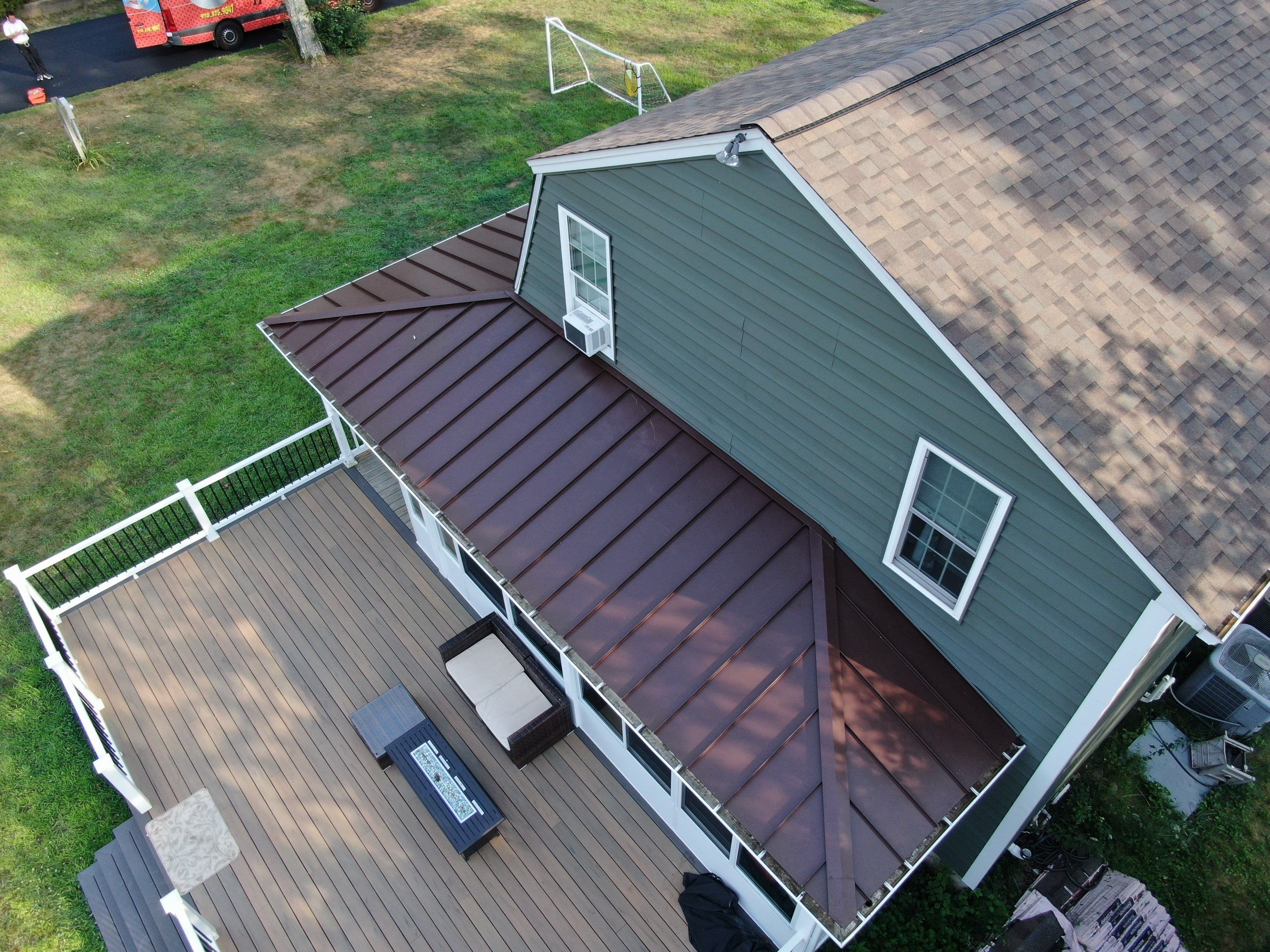 Full Roof Replacement & Farmers Porch Restoration – Asphalt + Standing Seam Metal by Mighty Dog Roofing of Greater Middlesex County