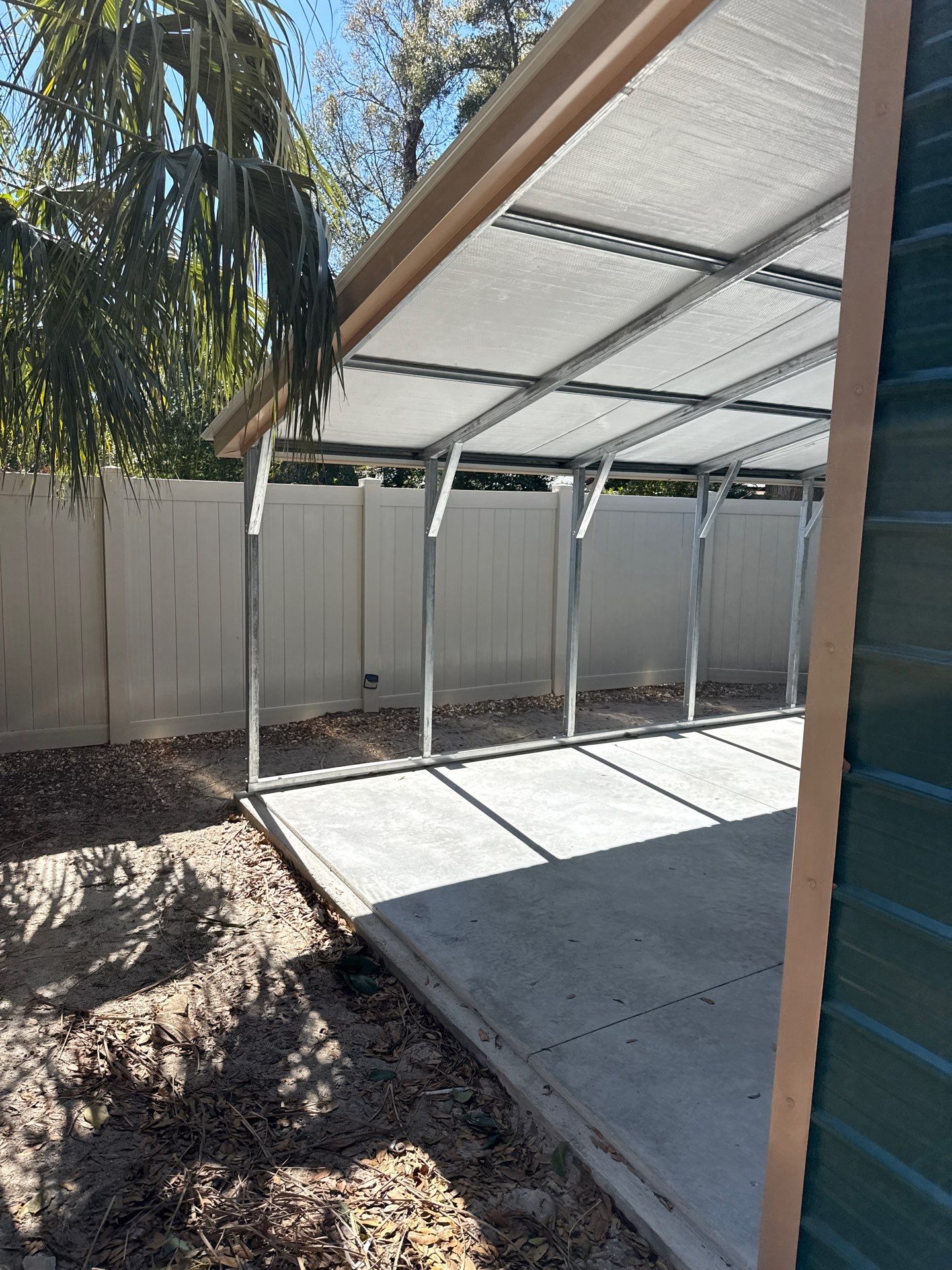 White 6-inch K-style Gutters and Down Spouts using Seamless Gutters White Down Spouts in Tampa FL by Gutter Professors