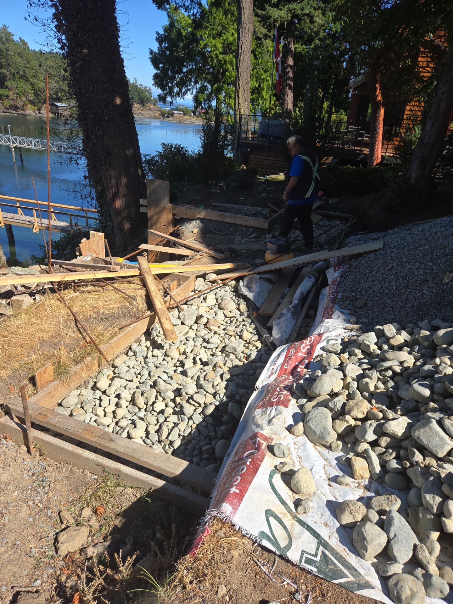 Coastal Landscape Restoration & Retaining Structure - In progress by Habanero Garden and Exterior Care