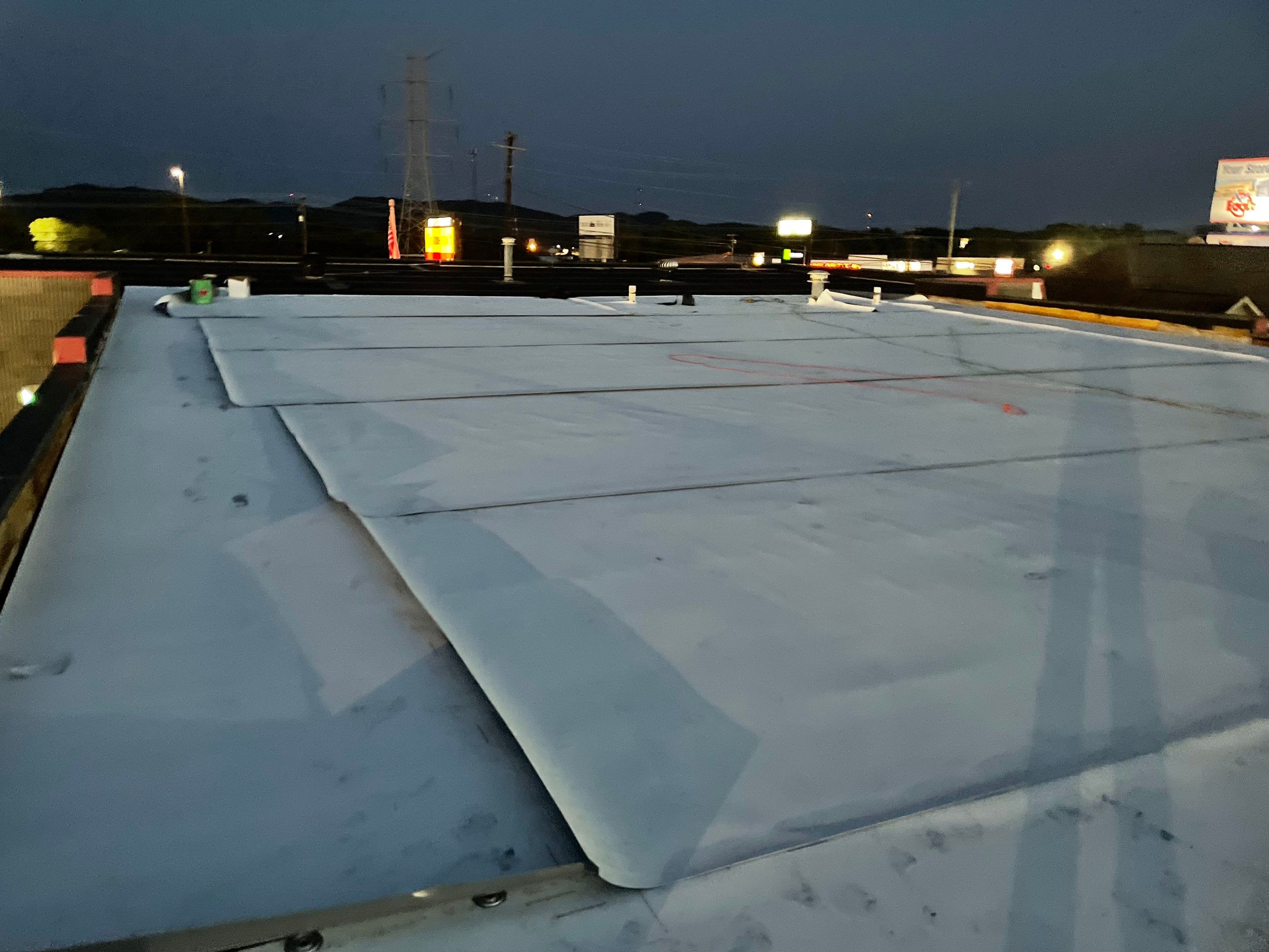 Commercial Roofing Installation by KISH RESTORATION 