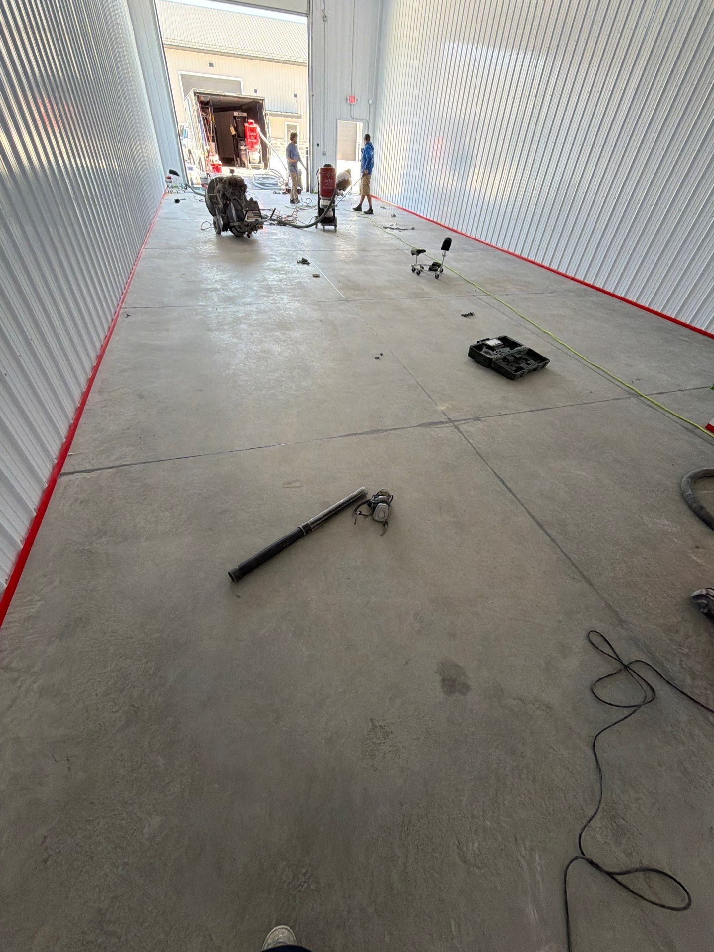 Commercial Storage Bay Epoxy Flake Floor Installation in North Muskegon by Gordon Painting