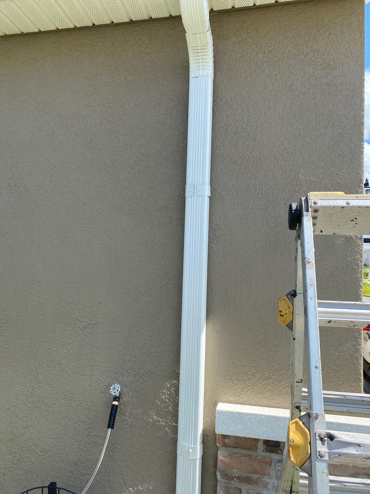 Gutter System with Downspouts in Bradenton FL by Gutter Professors