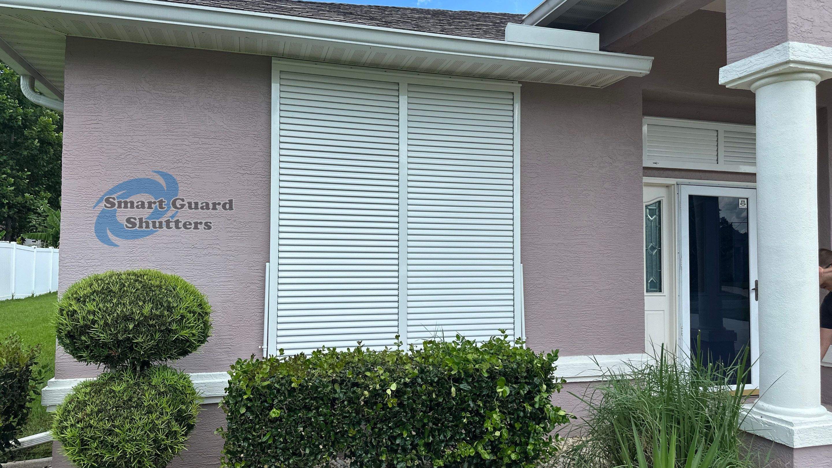 Impact Bahama Shutters in Signal White by Smart Guard Shutters