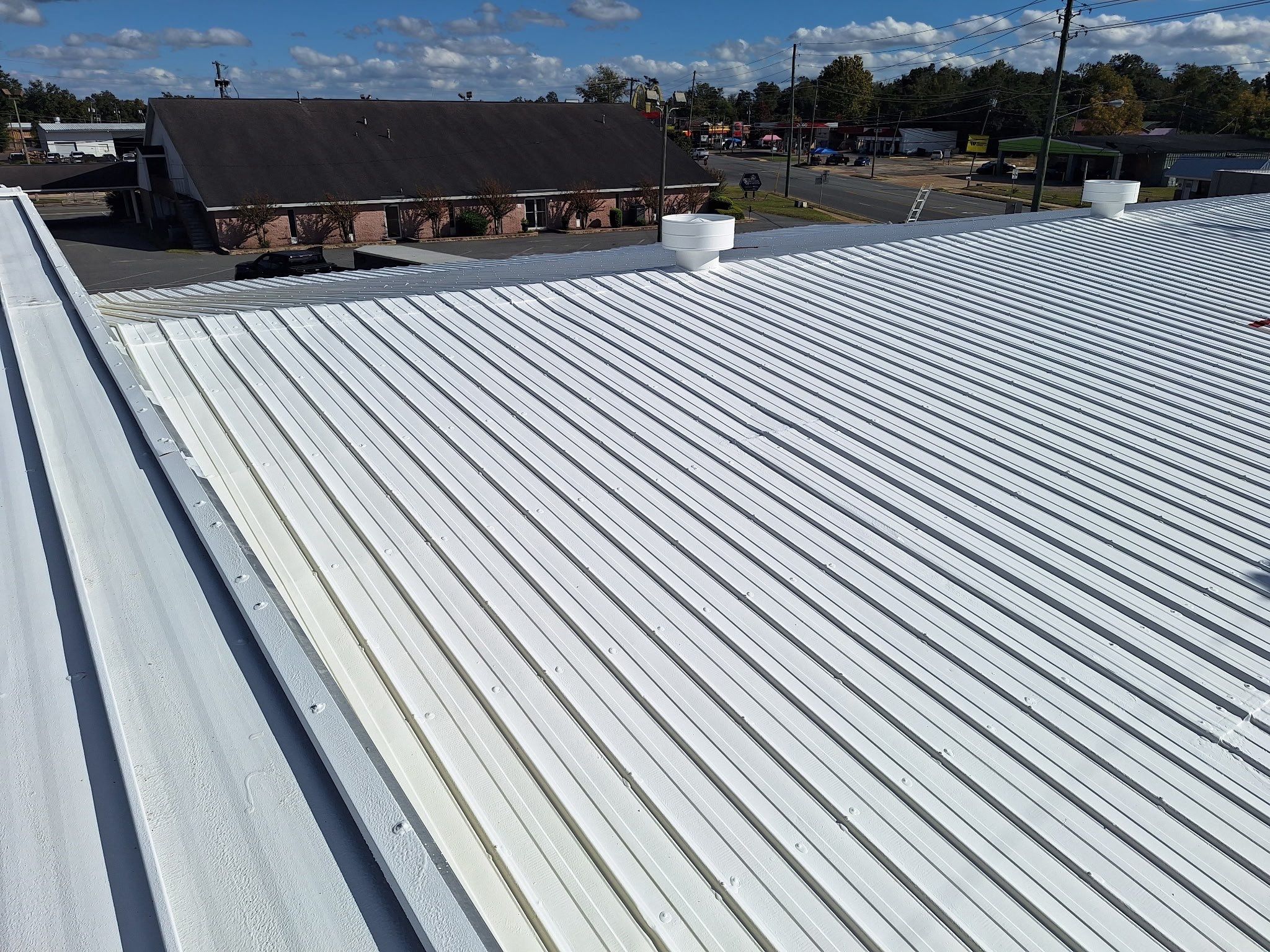 Metal Roof Restoration and Panel Replacement in Marianna by Southern Roof Solutions