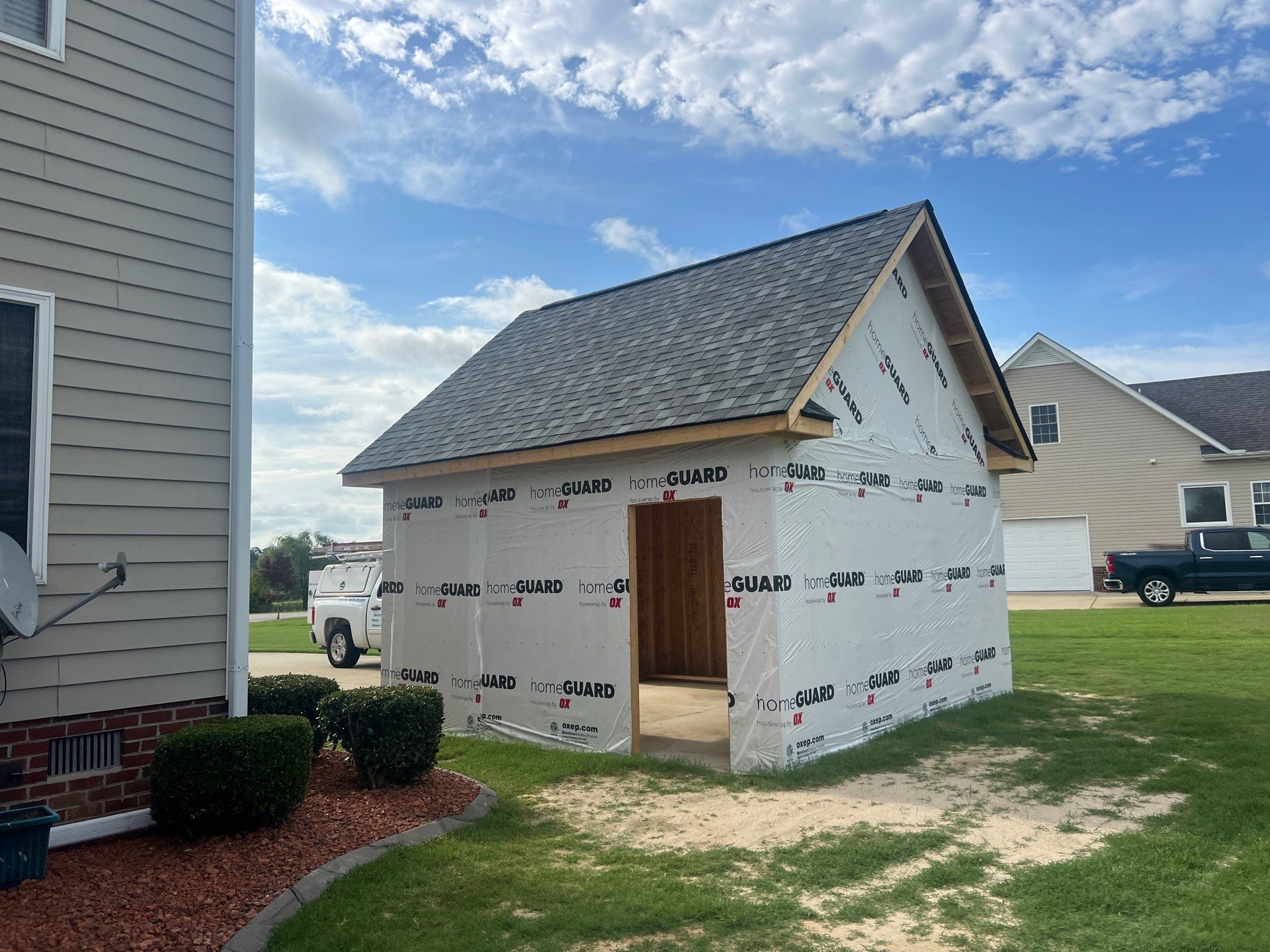 Custom Screened Porch and Concrete Walkway Installation in Rocky Mount by The Remodeling Company