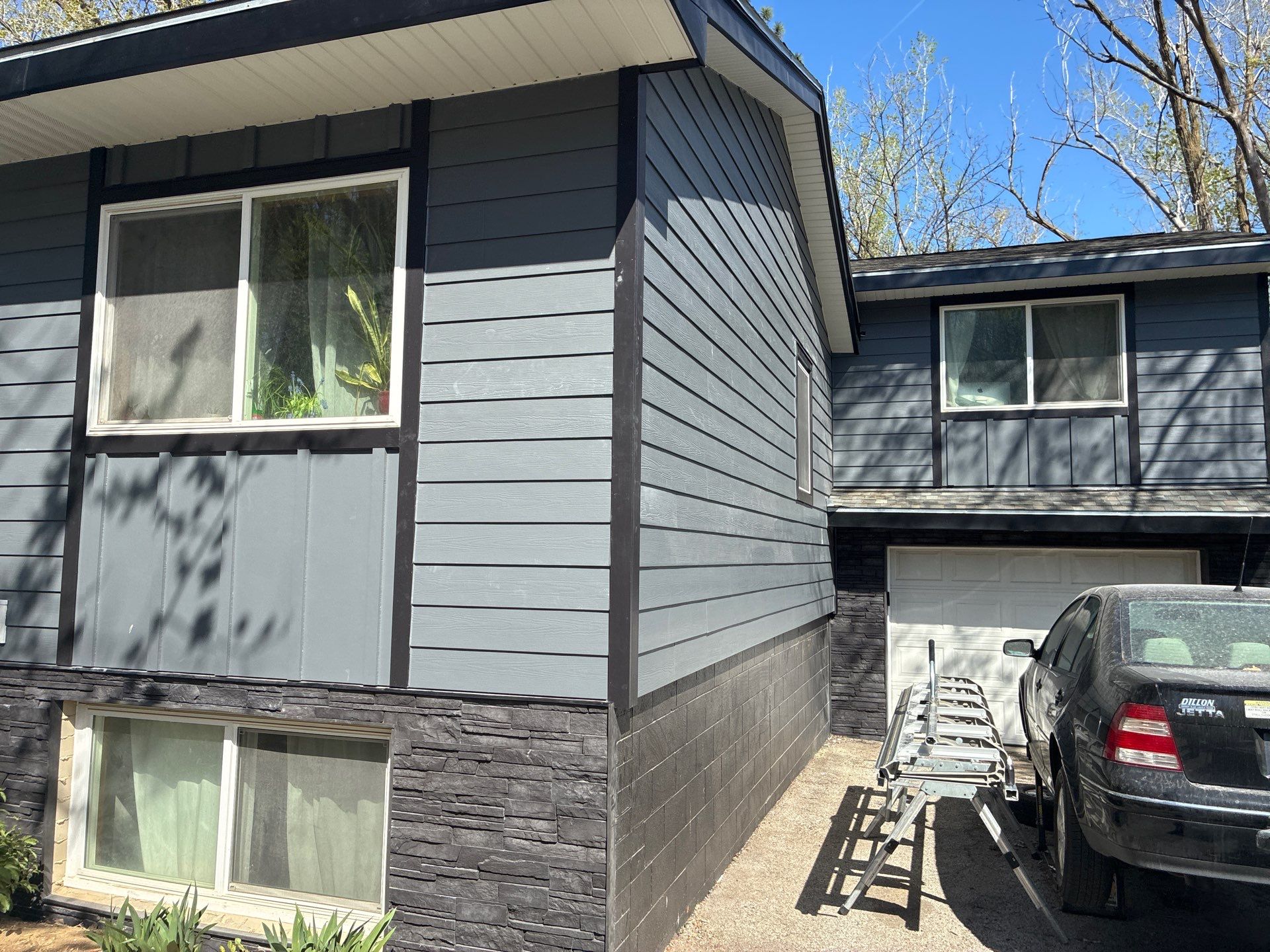 James Hardie Siding and Versetta Stone Exterior Renovation in Bellevue by Carps Complete Exteriors