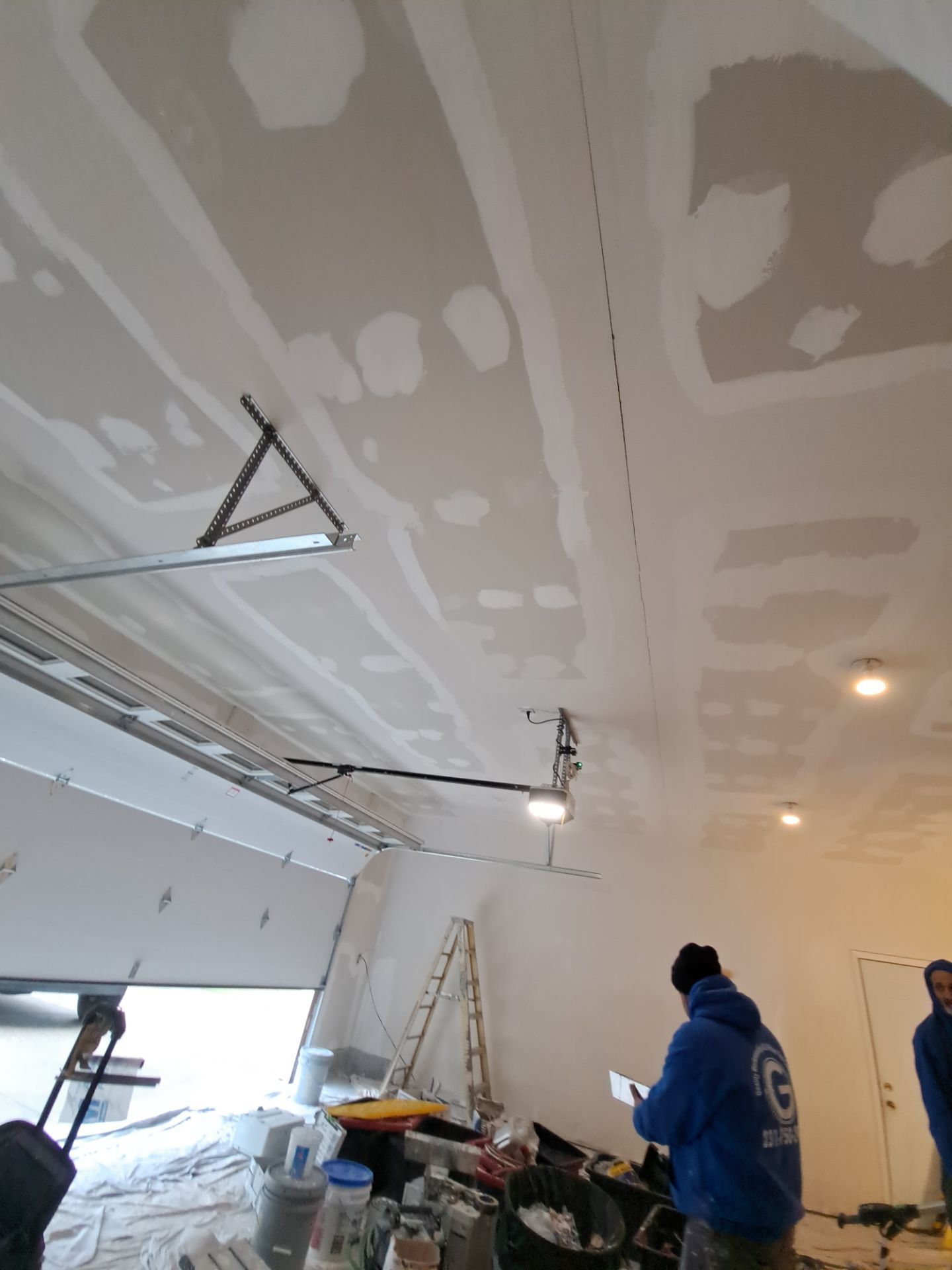 Garage dry wall repair/ re-texture, re-paint by Gordon Painting