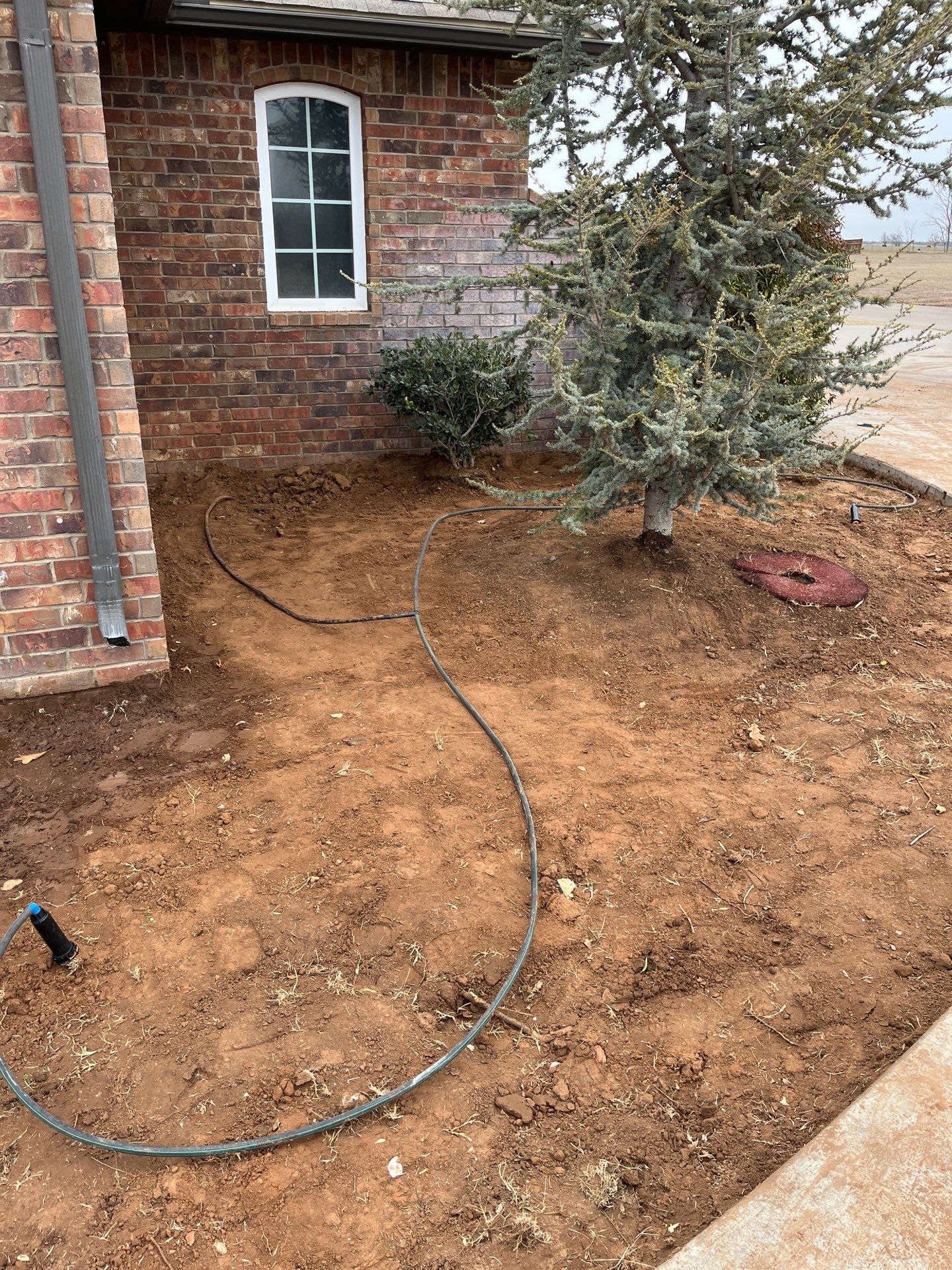 Landscape installation w/ irrigation and landscape lighting by Clays Services Inc