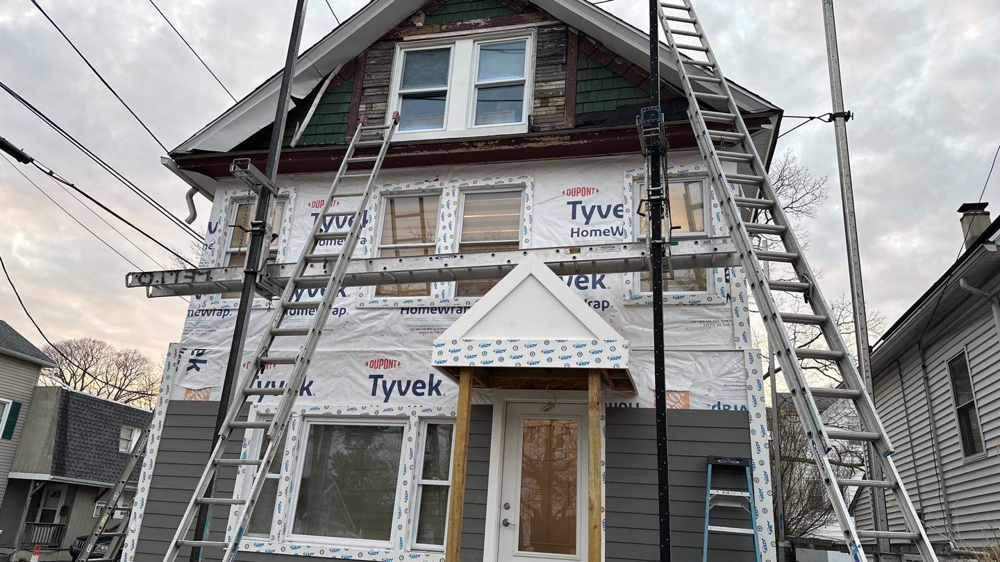 Siding Installation using Hardie Plank Aged Pewter by A Plus Exterior