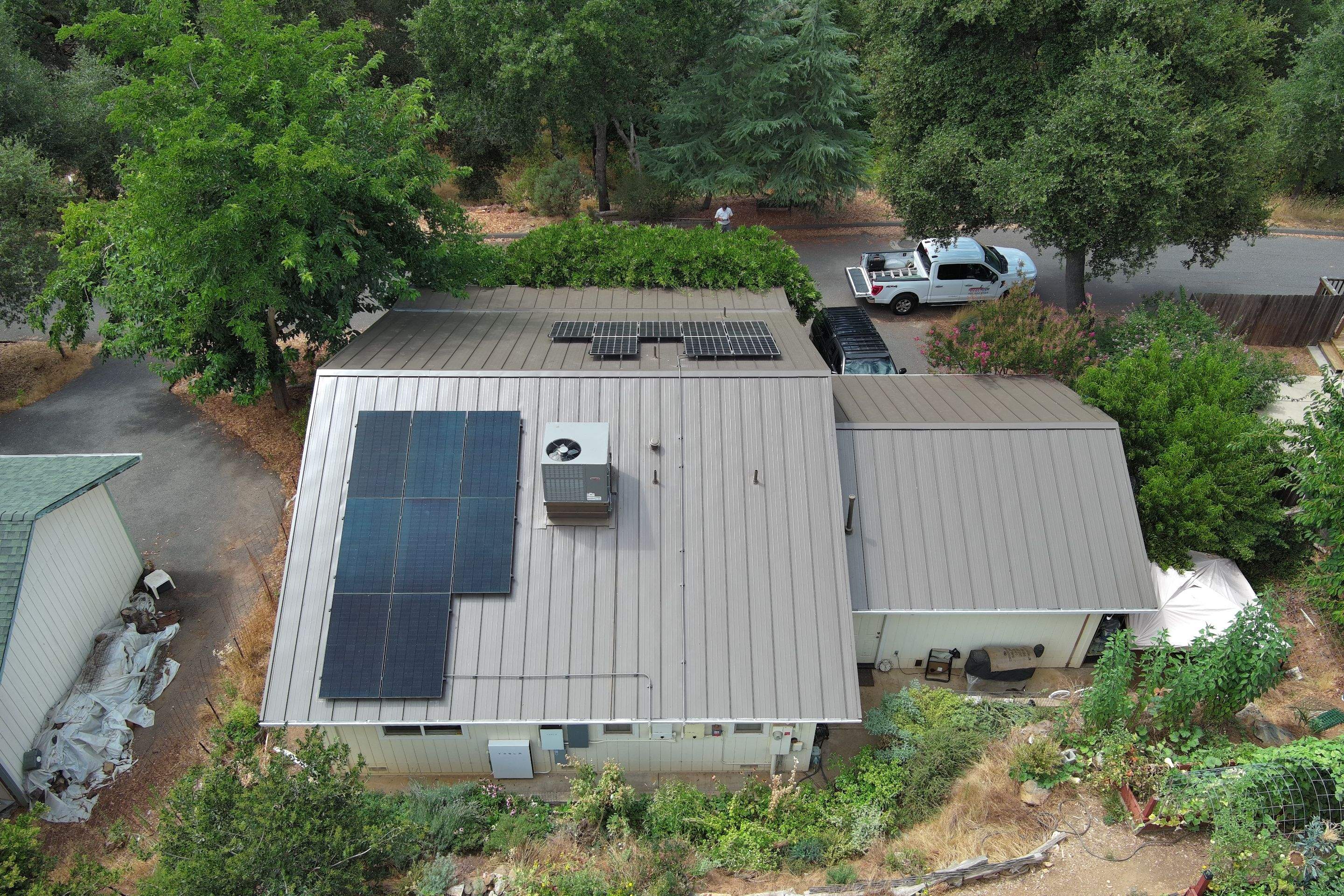 Metal roofing installation using ASC Standing Seam metal by Straight Edge Roofing Inc