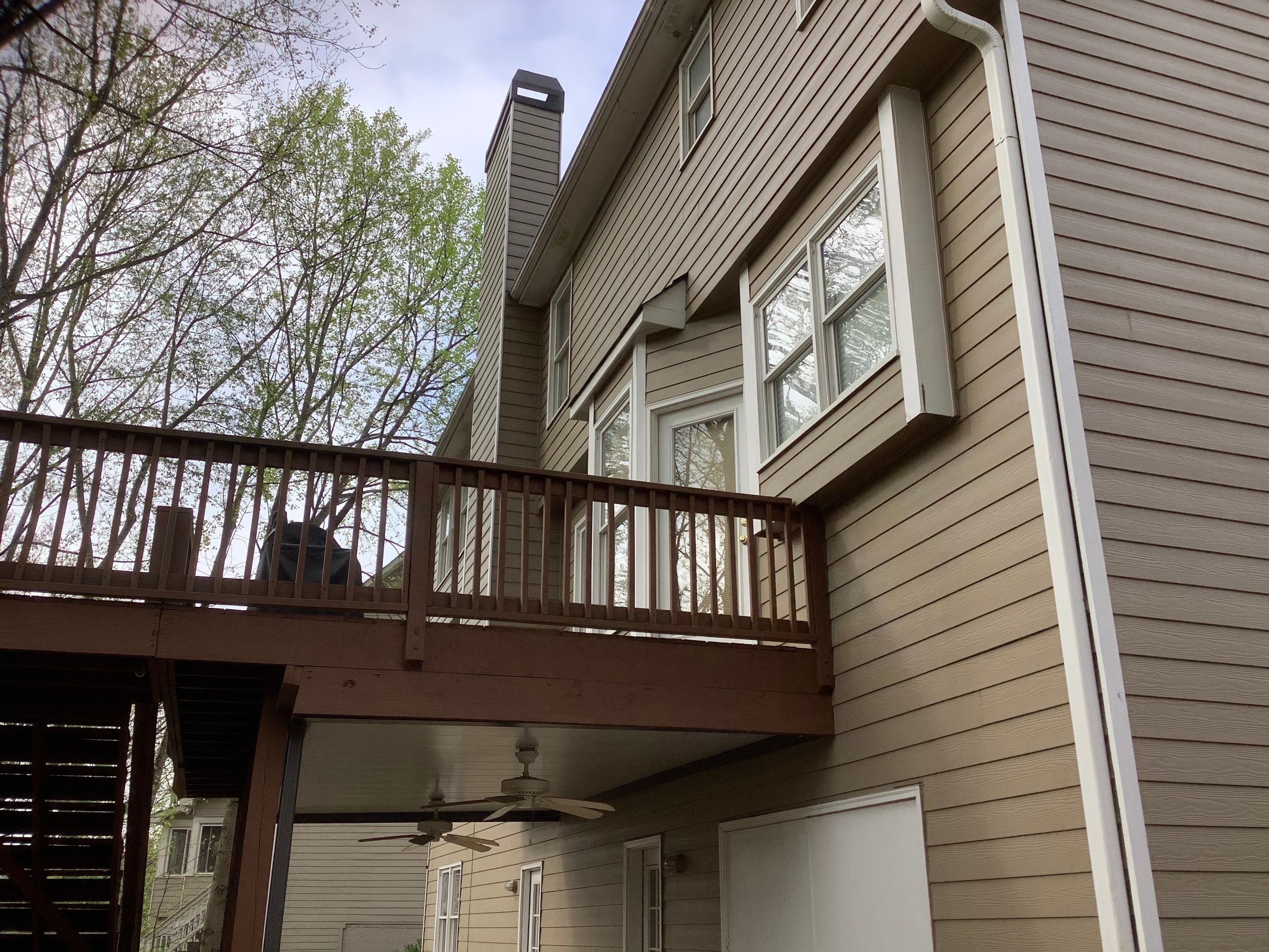 Residential Exterior Painting and Deck Refinishing Project in Kennesaw by Swift Home Renovations