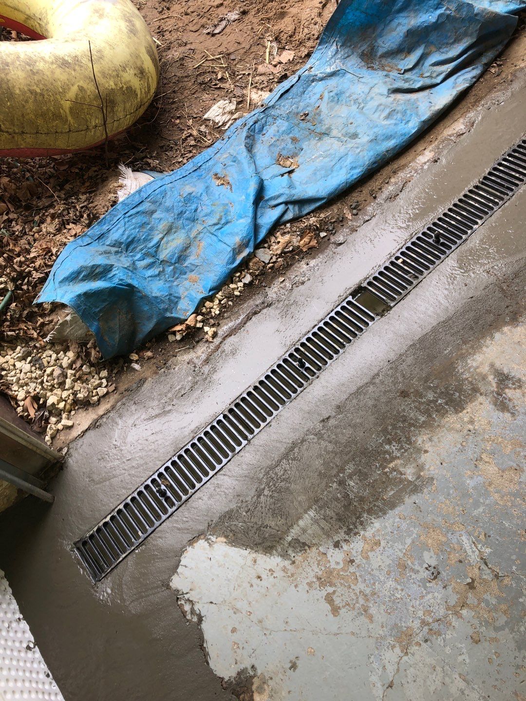 Basement Waterproofing using Drain tile system and a foundation wrap by ACE Waterproofing & Basement Solutions