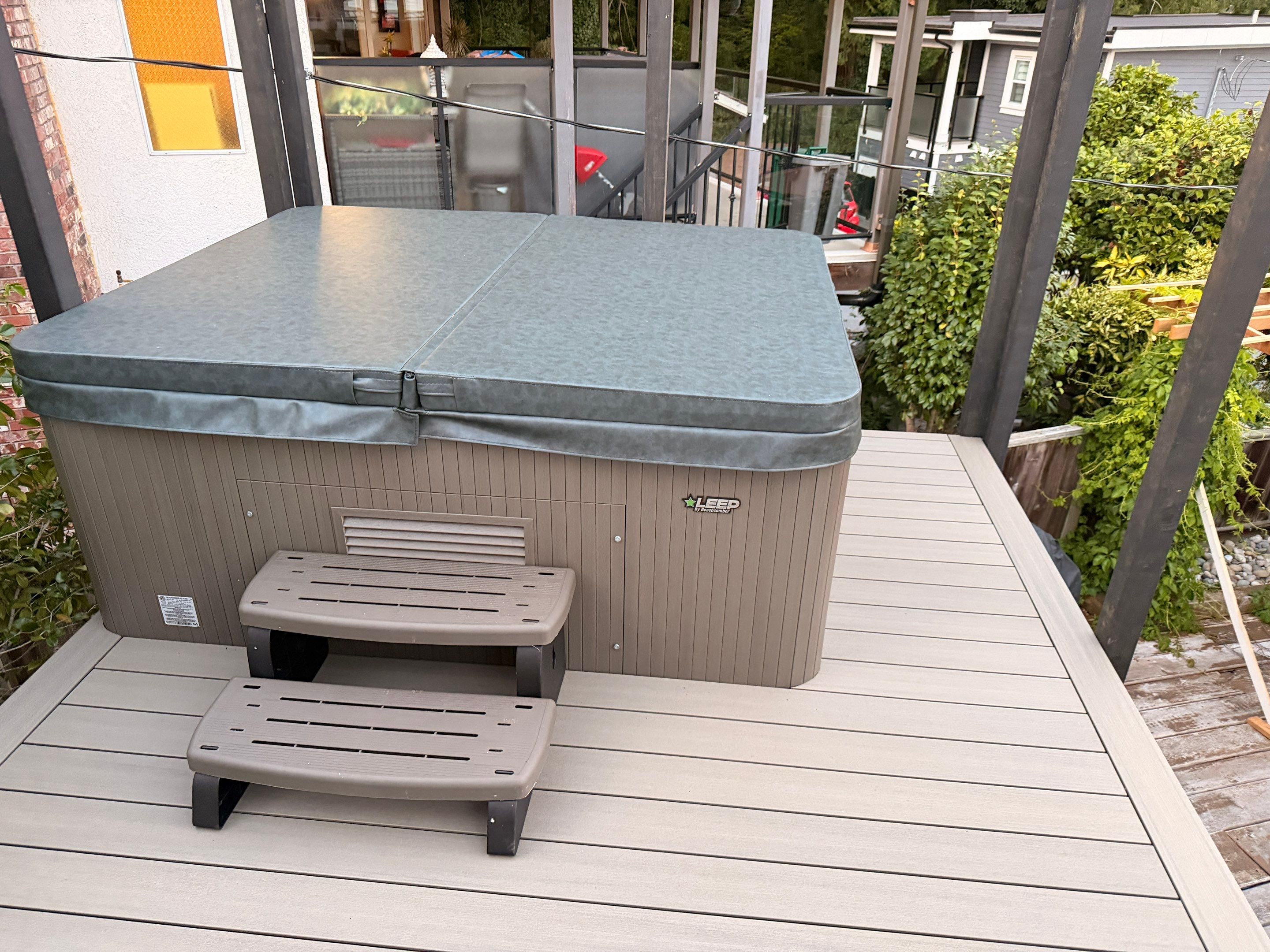 New Composite Deck with glass railing in North Vancouver by YVR Construction Group