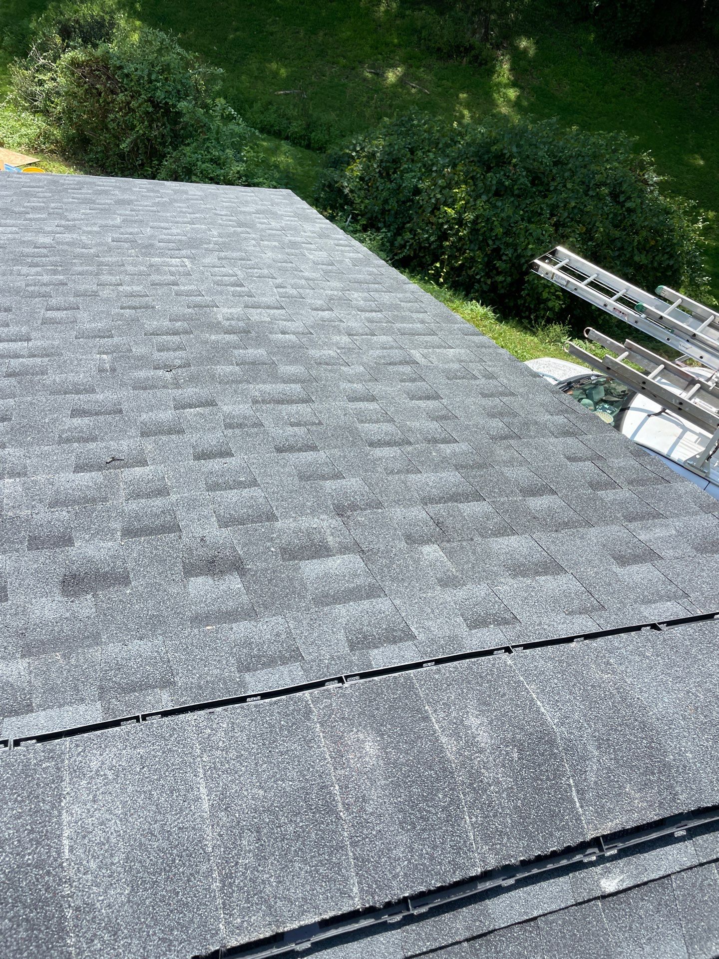 Residential Roofing Installation using GAF Timberline HDZ Charcoal by Rainstoppers Roofing