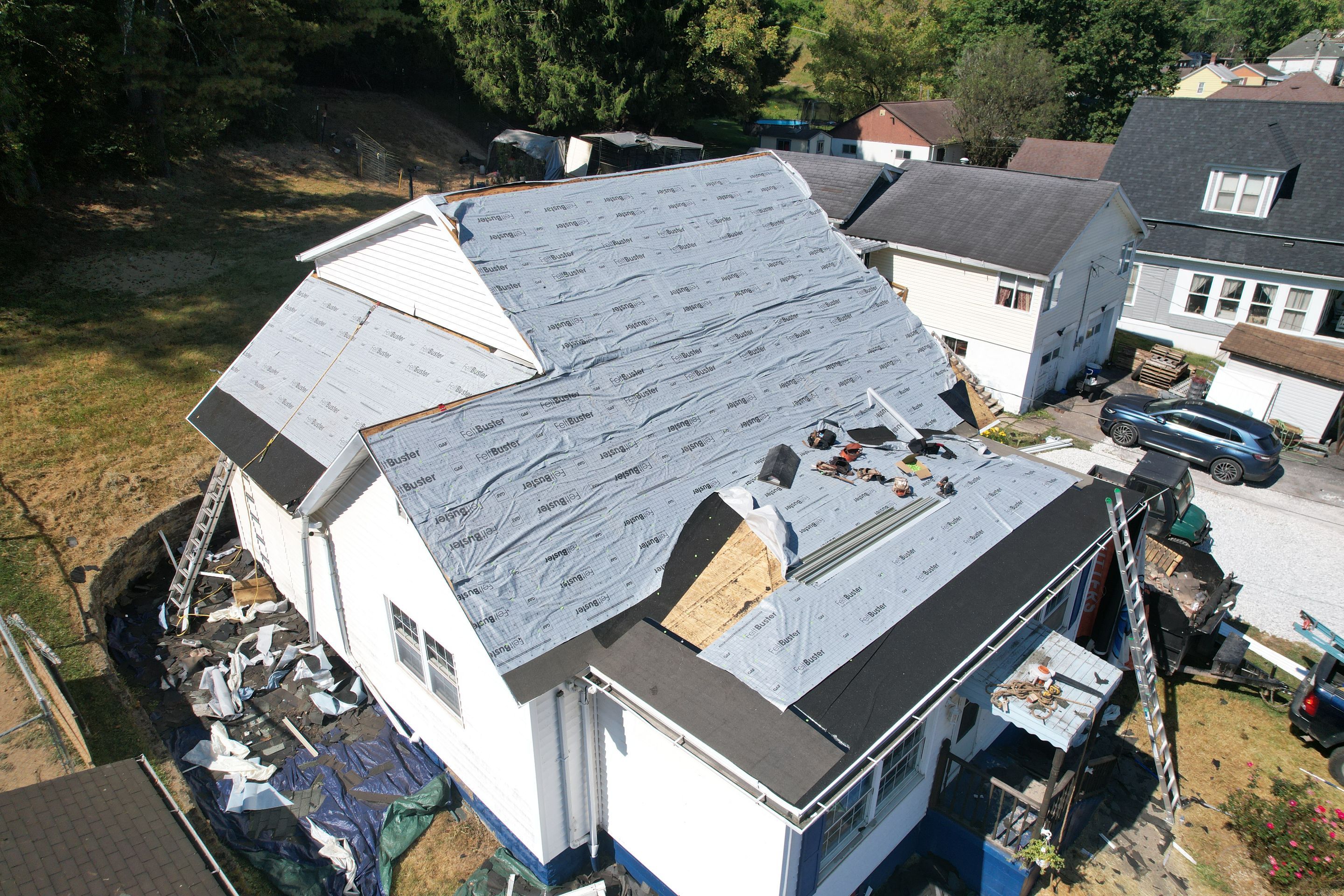 Residential Roofing Installation using GAF Timberline HDZ Biscayne Blue by Rainstoppers Roofing