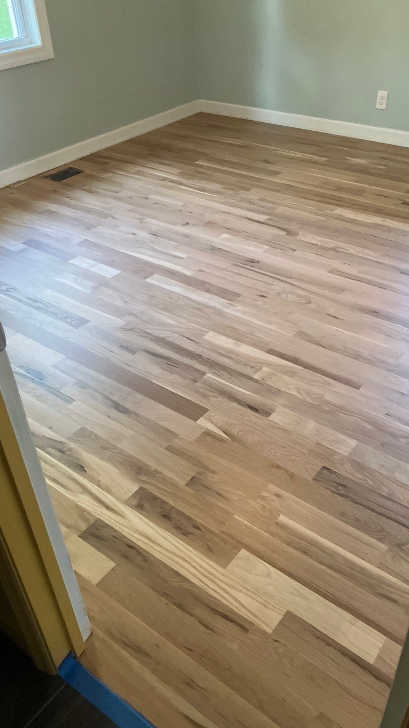 Replaced Carpet with New Hardwood Floors  by Footprints Floors of Nashville