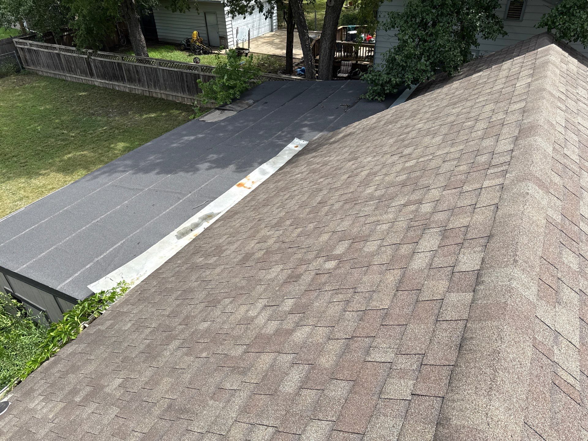 Storm Damaged Roof Replacement - Before & After by Eaton Roofing 