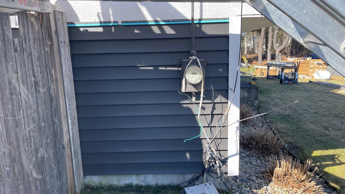 Complete Exterior Renovation with New Siding & Gutters   by Sensible Home Solutions