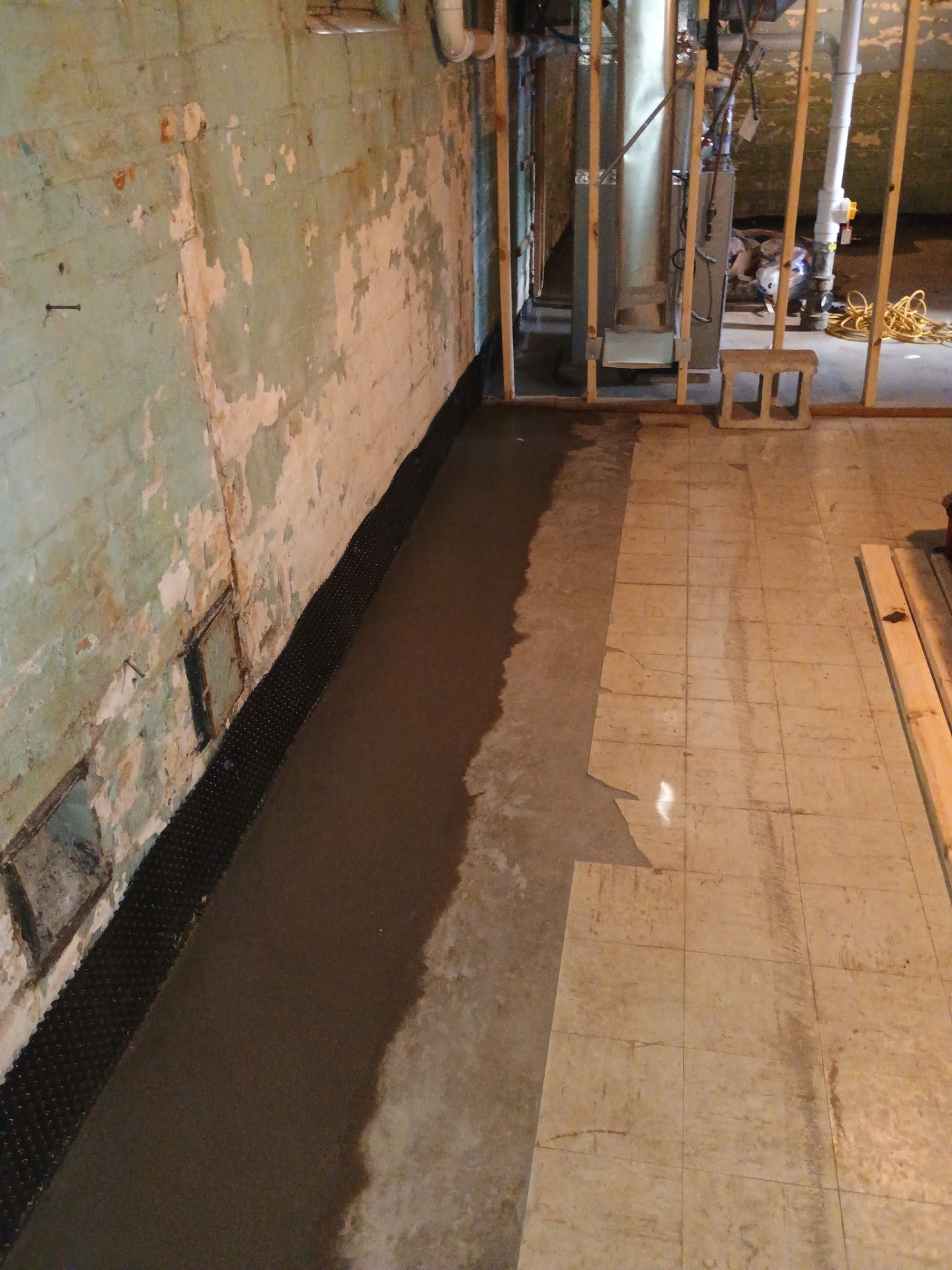 Interior Drain Tile for a South Minneapolis Basement by Waterproofing Northeast