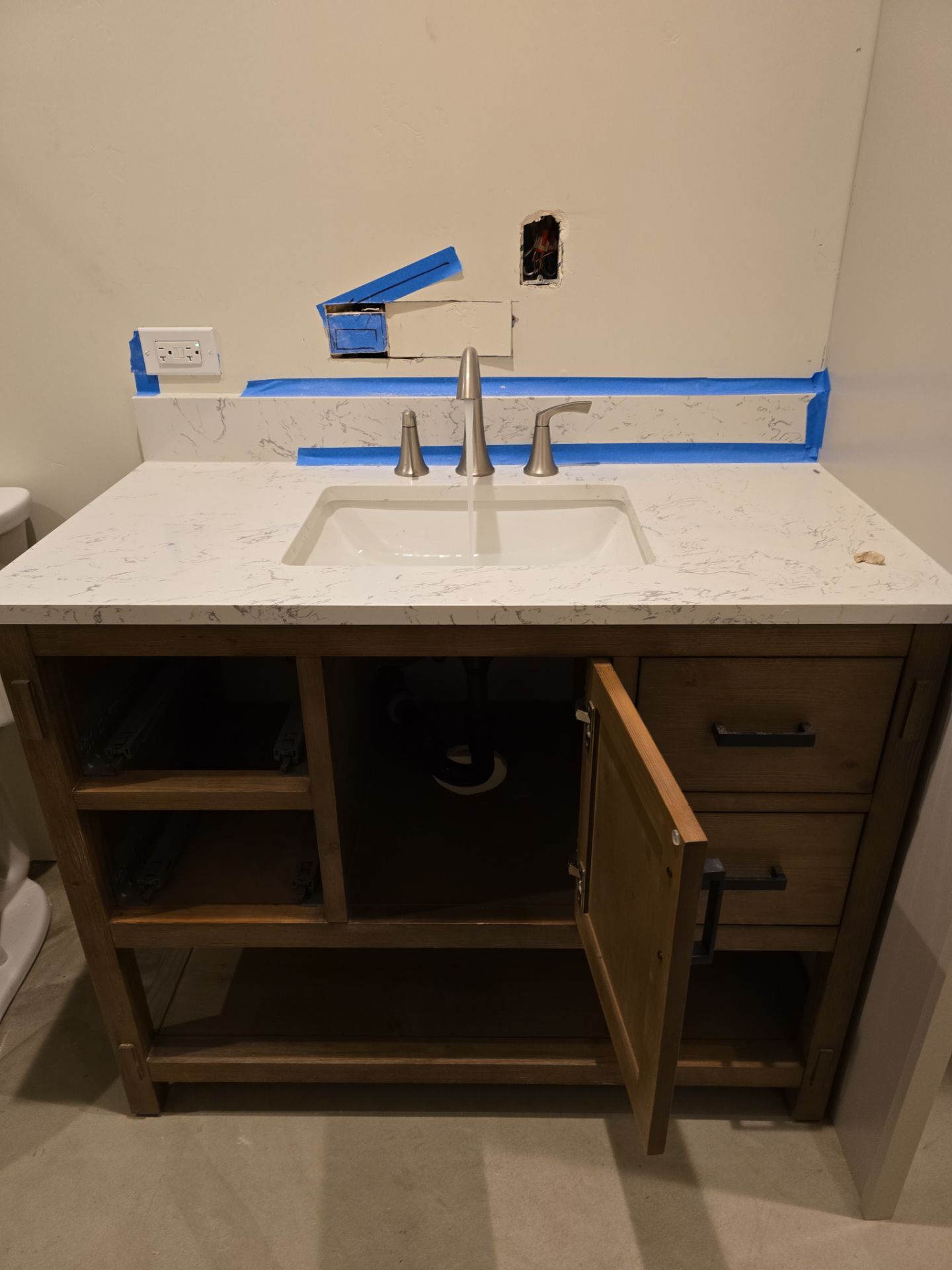 Installation of New Sink Flange, Piping, Fixtures, and Water Heater by Us Plumbing 