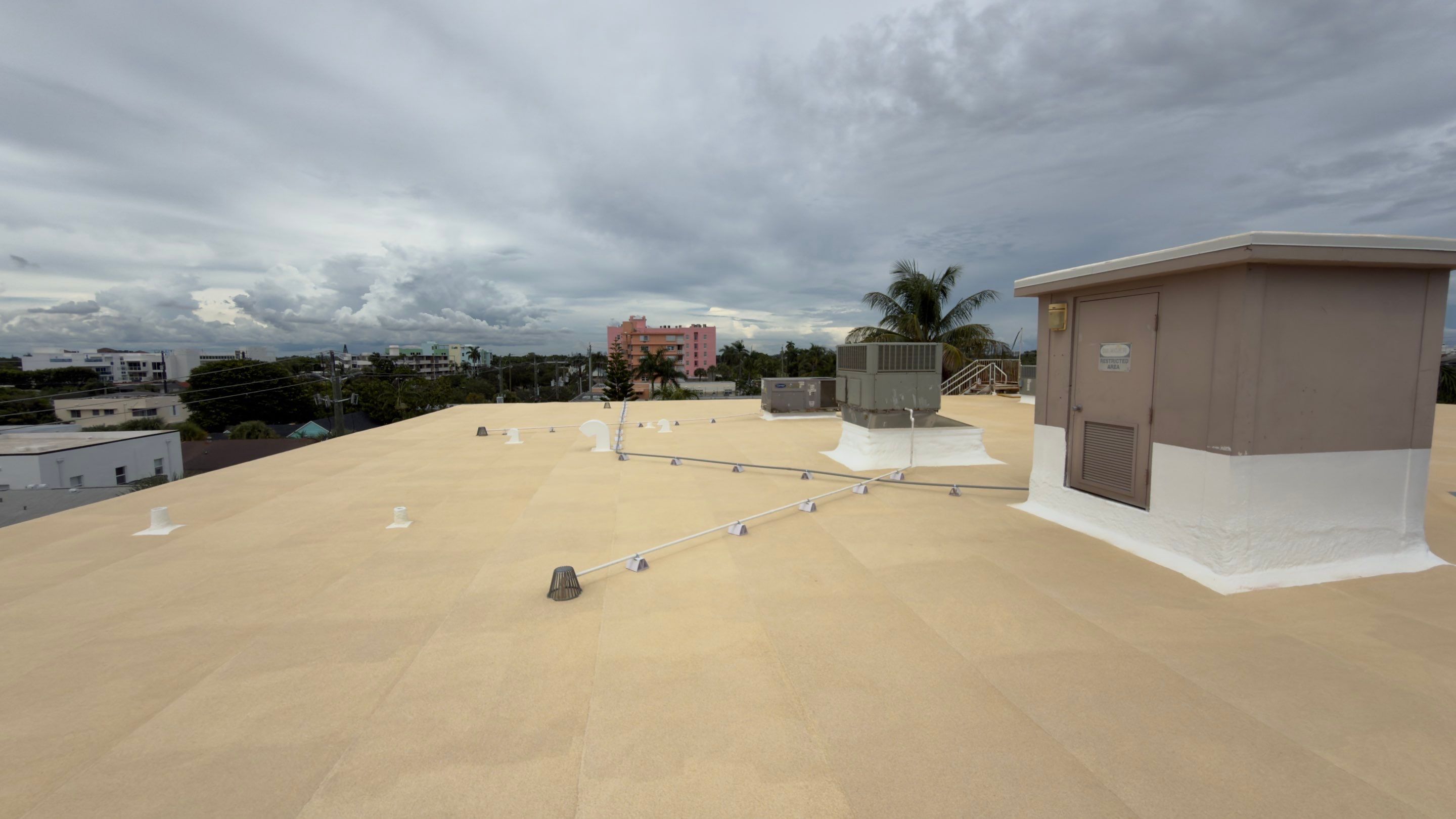 Commercial Roof Restoration for Lake Worth Beach Flat Roof Project by Roof King LLC