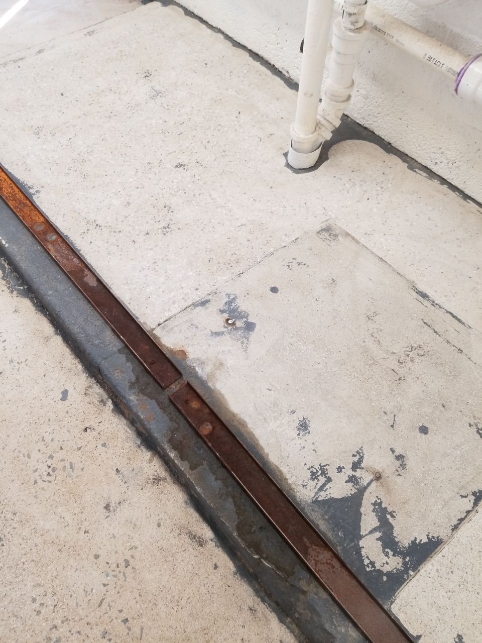 Laundry Room Floor Coating using Penntek- Silver Creek by Spectrum Painting, LLC