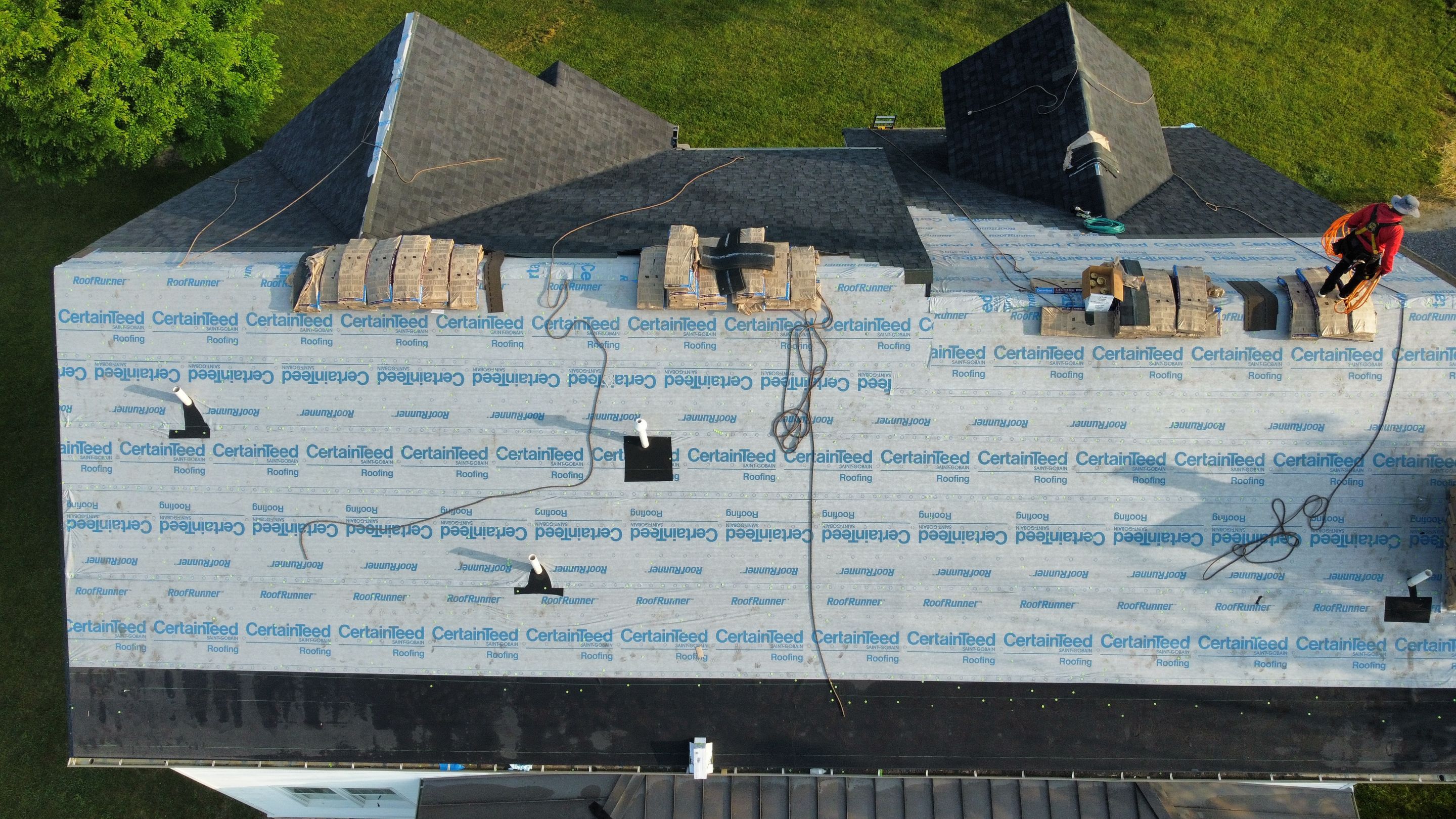 Roof Damage using Certainteed Lifetime Roofing System- Moire Black Landmark Pro shingkes with shadow ridge caps. by BulletpROOF Exteriors