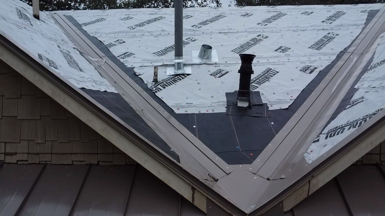 Metal Roof Replacement - Roofing Contractor - Rox Roofing by Rox Roofing