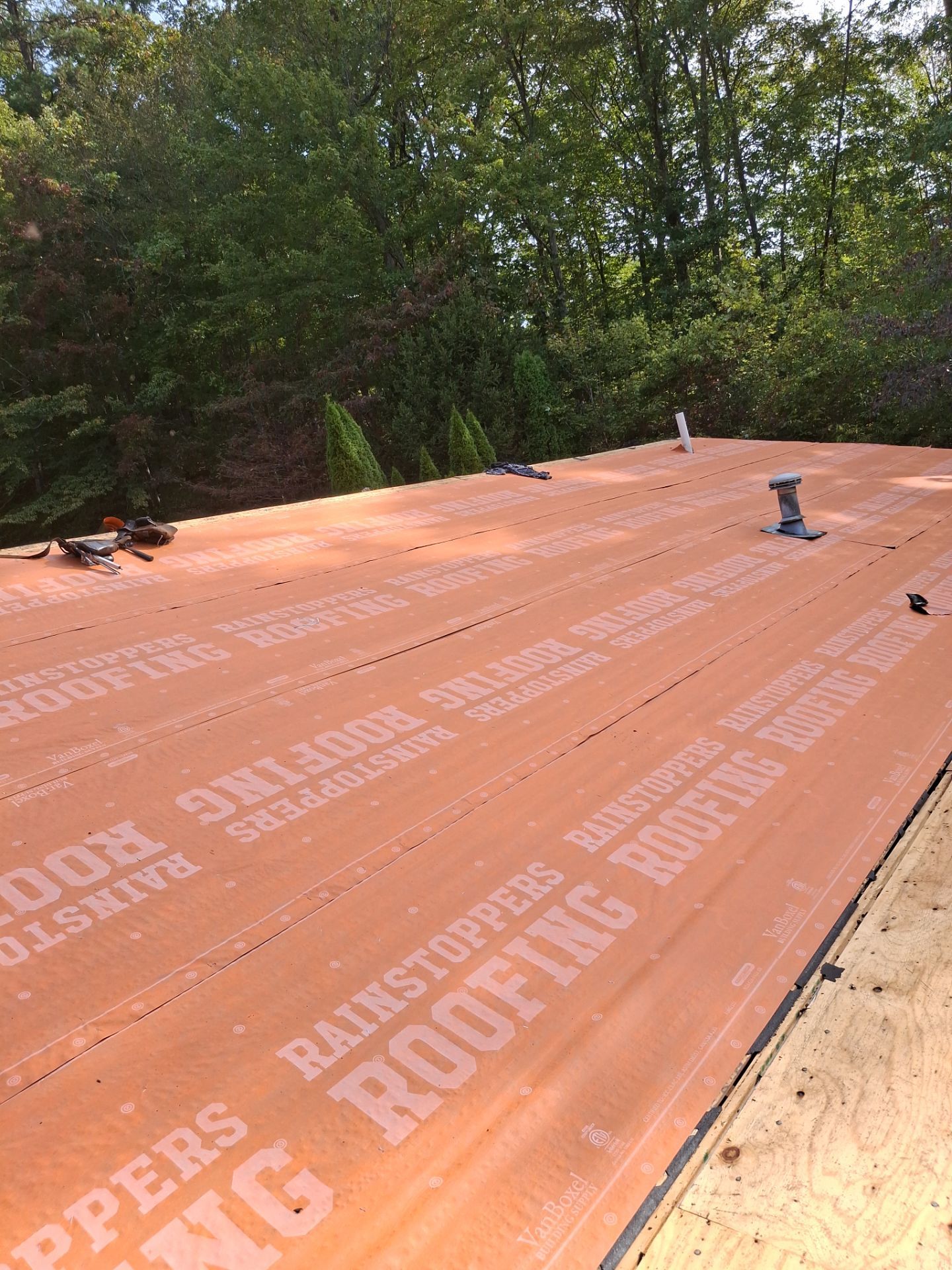 Residential Roofing Installation using GAF Timberline HDZ Charcoal by Rainstoppers Roofing