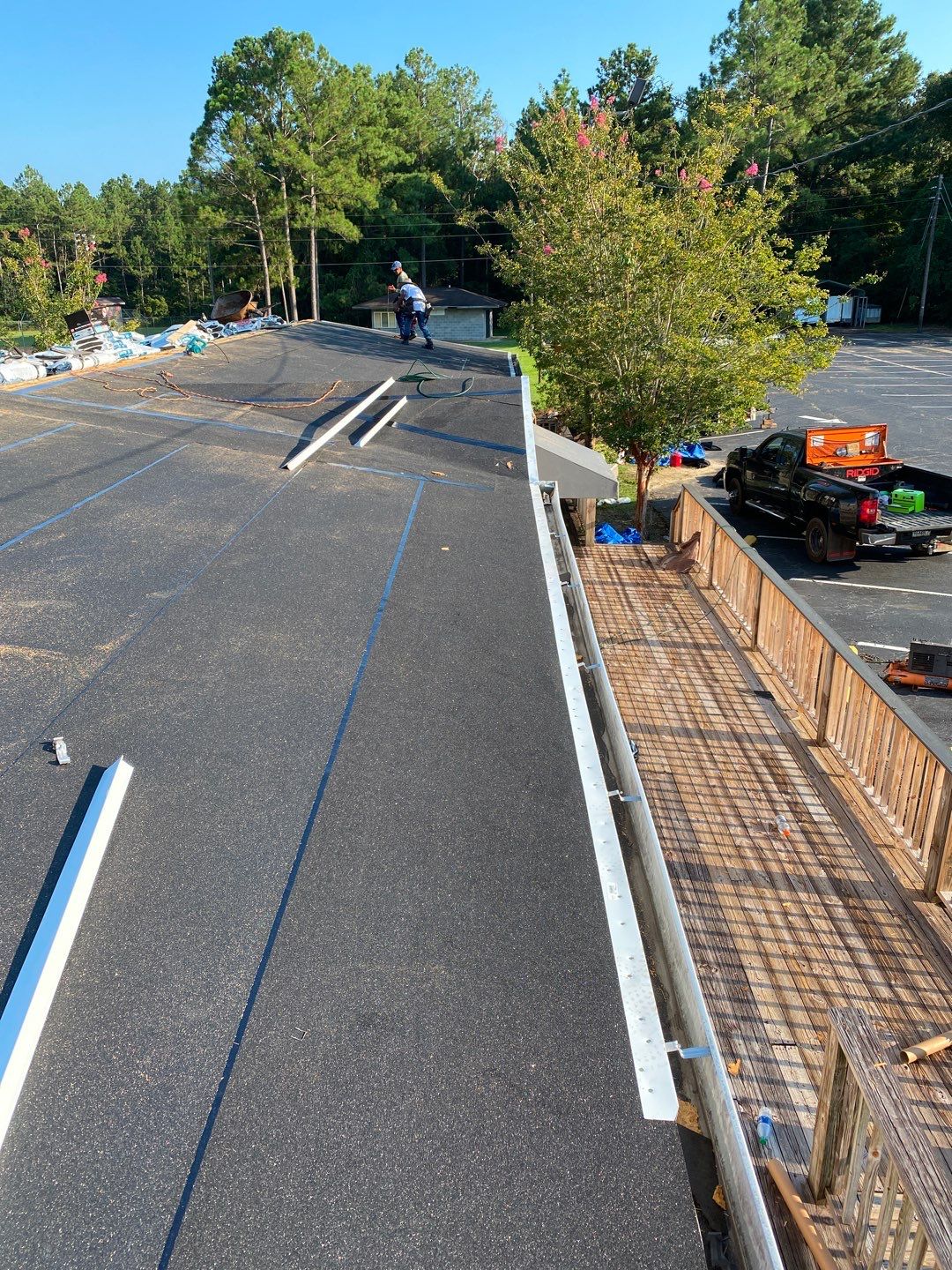 Commercial Roofing Installation using Roof Replacement by American Roofing & Construction LLC