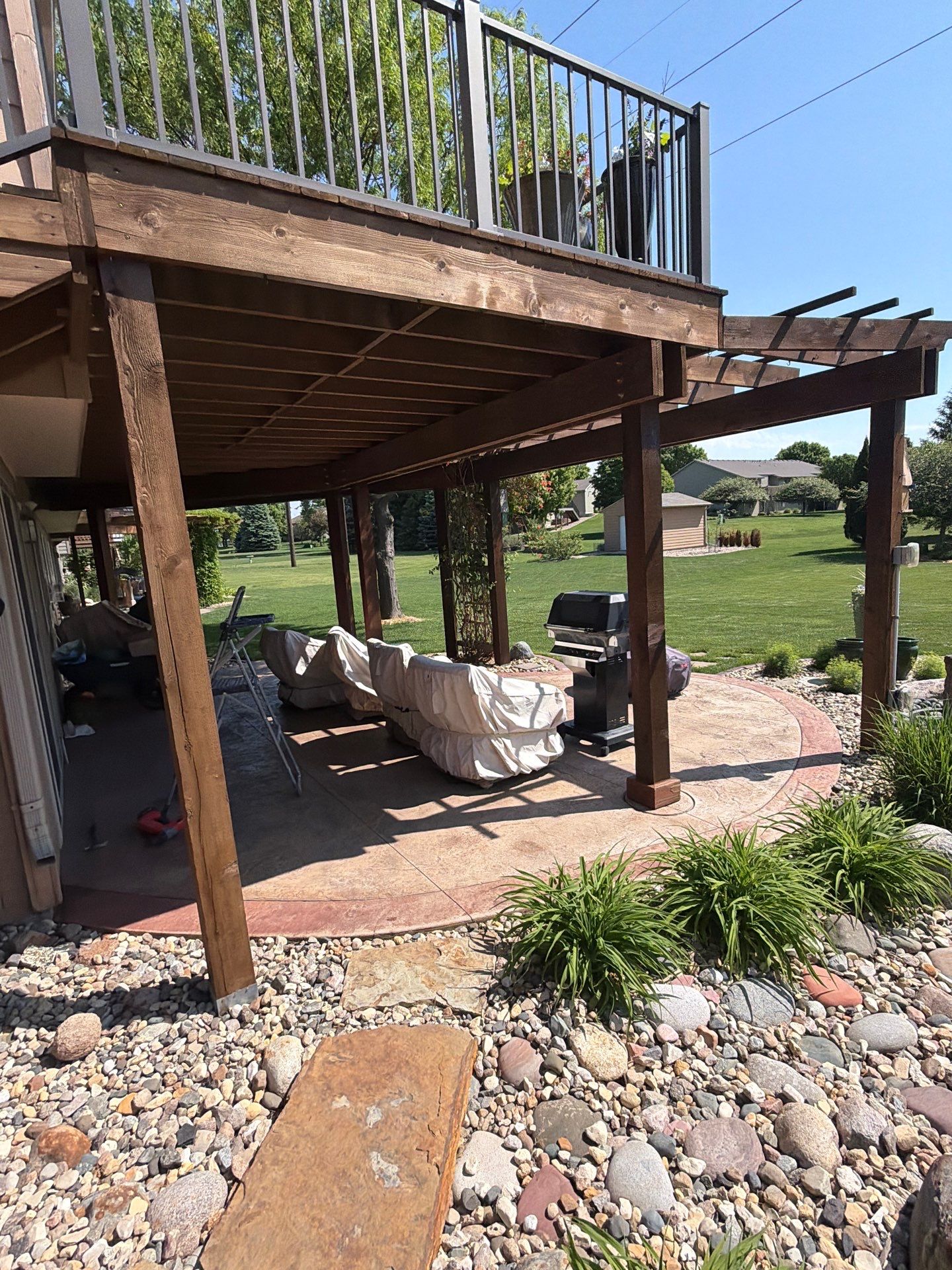 Tiered Wood Deck and Pergola Refinishing in Sioux Falls by Select Painting, Coatings & Garage Cabinets
