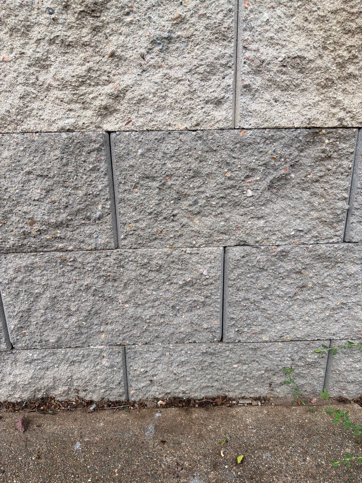 Exterior Masonry Painting for a Sioux Falls Retaining Wall by Select Painting, Coatings & Garage Cabinets