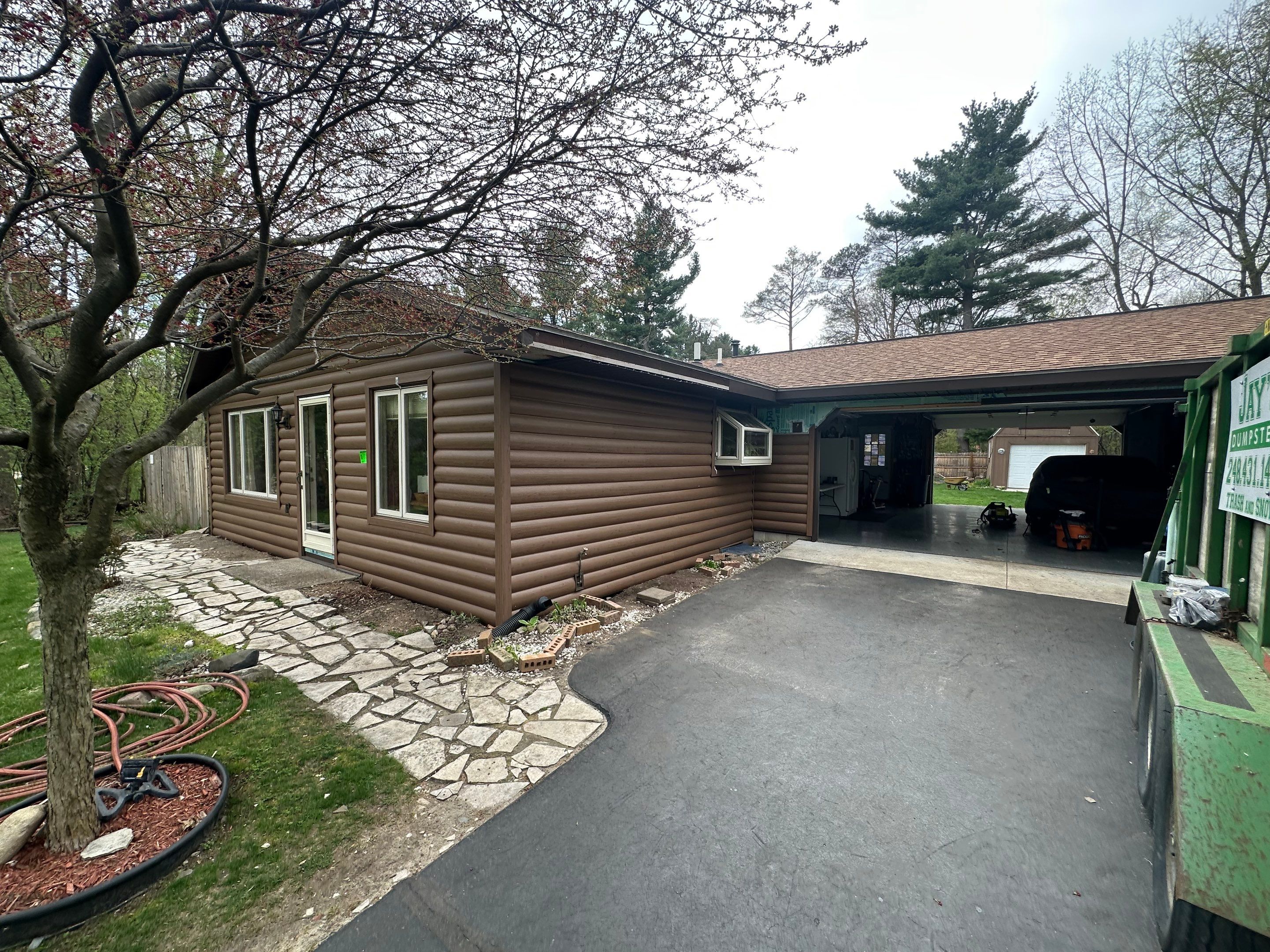 Siding Installation using Timbermill Forest Brown by 180 Contractors