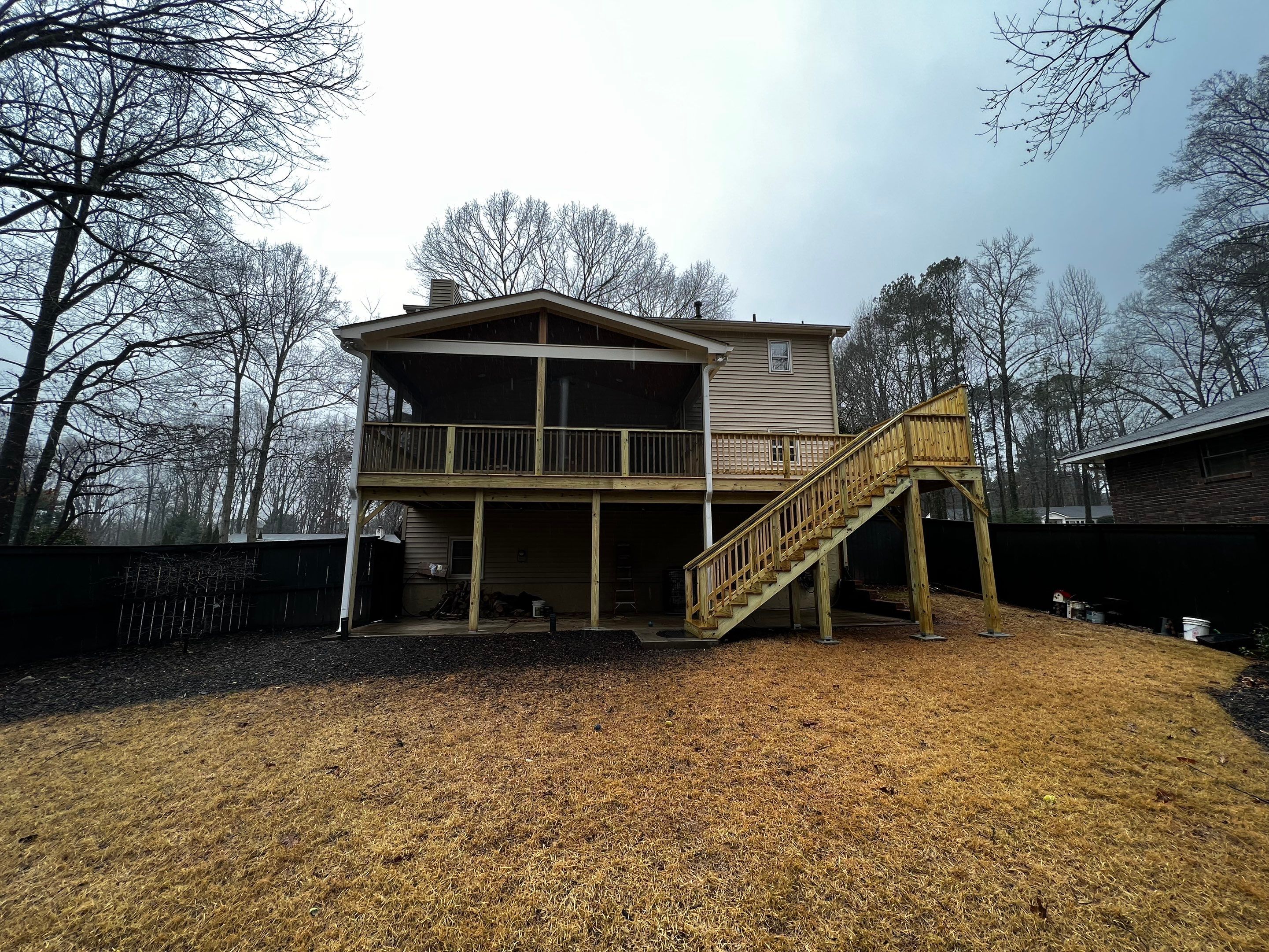 Custom Screened-In Porch and Elevated Deck Construction in Smyrna by Swift Home Renovations