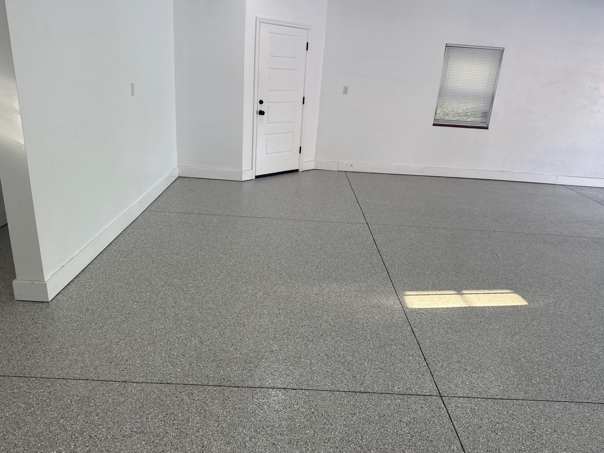 Garage Project in Mount Everest by Cross Creek Concrete Coatings
