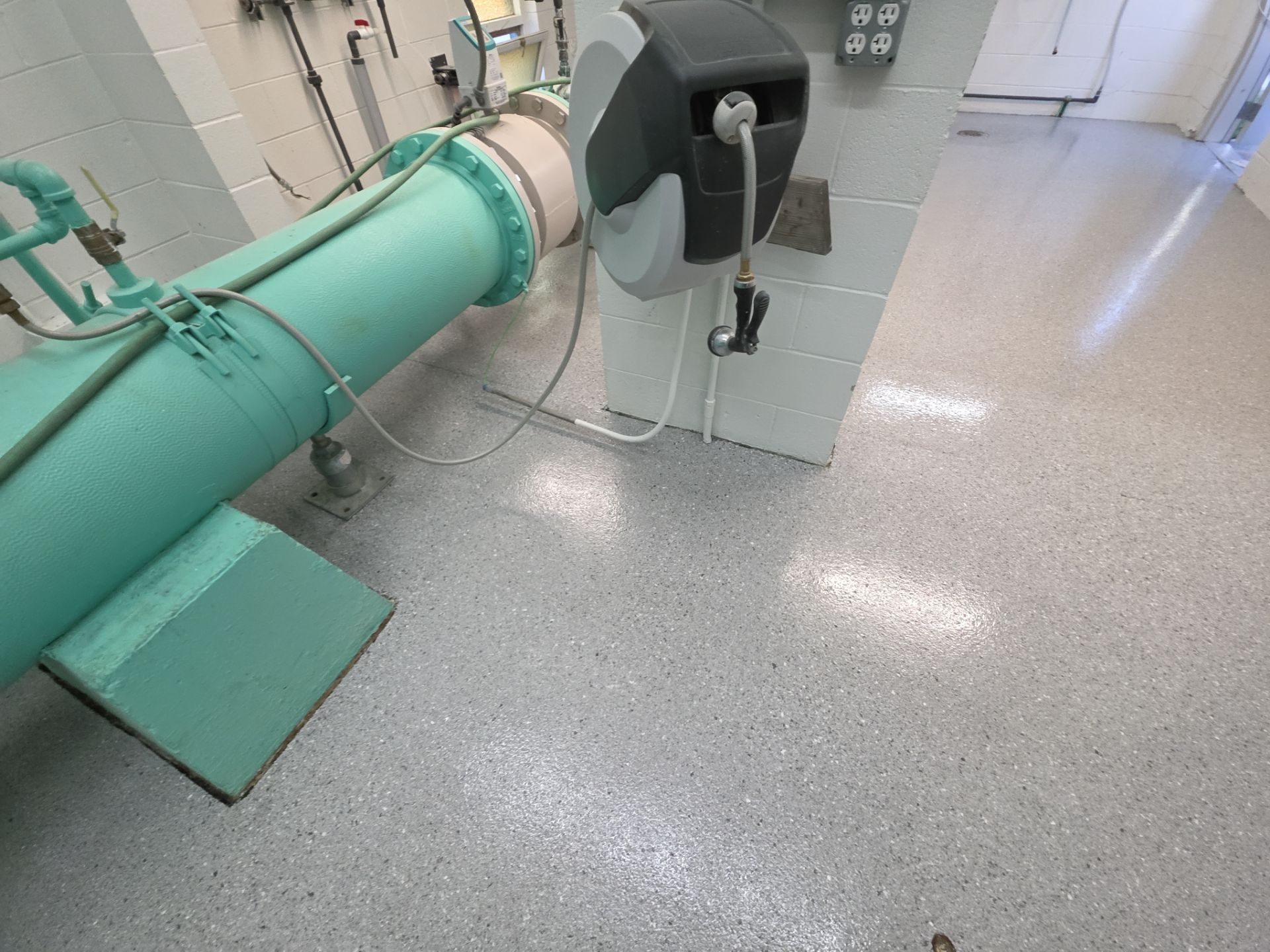 Commercial Floor Transformation using Battleship Hybrid by Croc Coatings, LLC