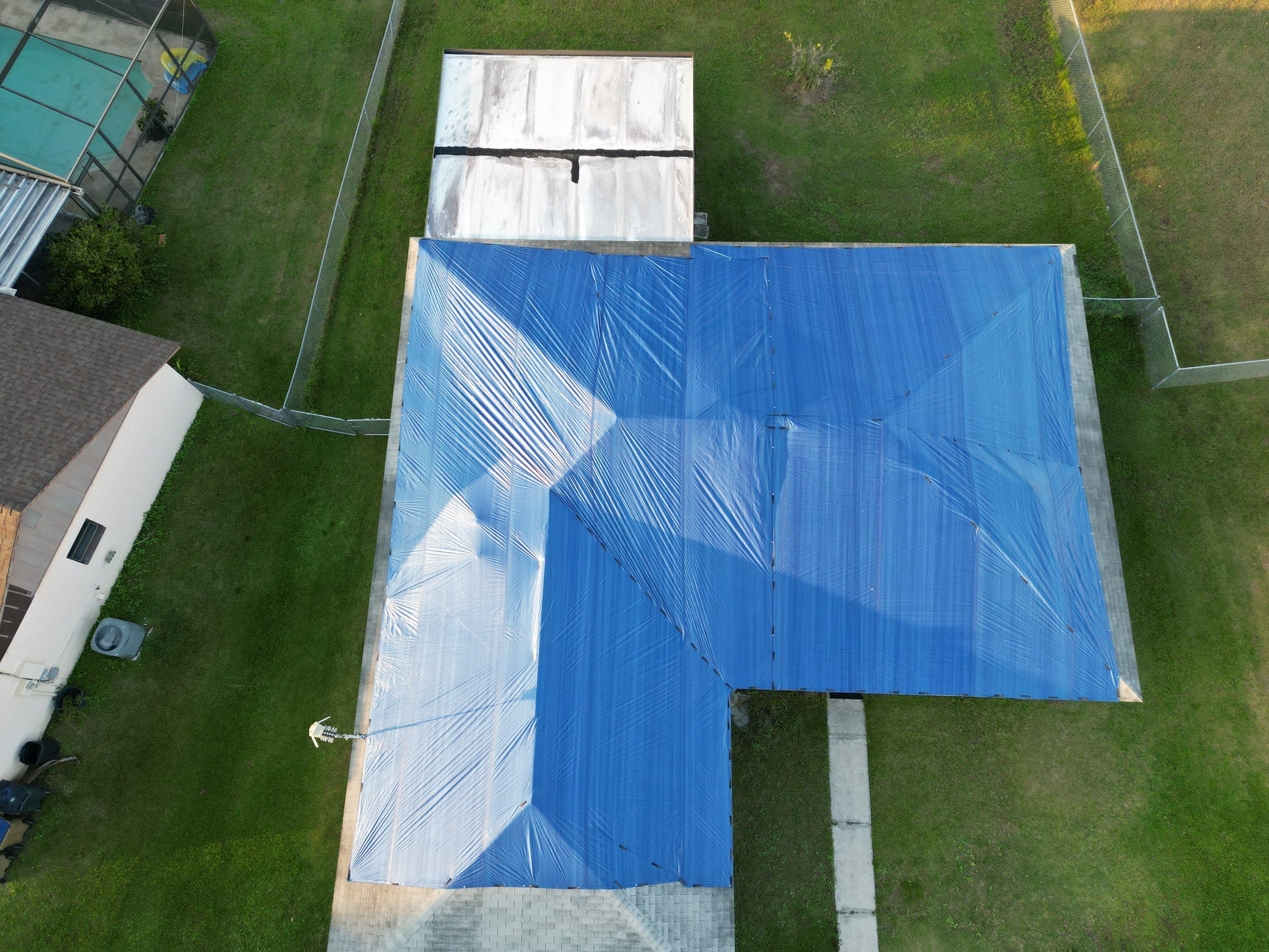 Tarp using TARP BLUE by AquaShield Restoration USA