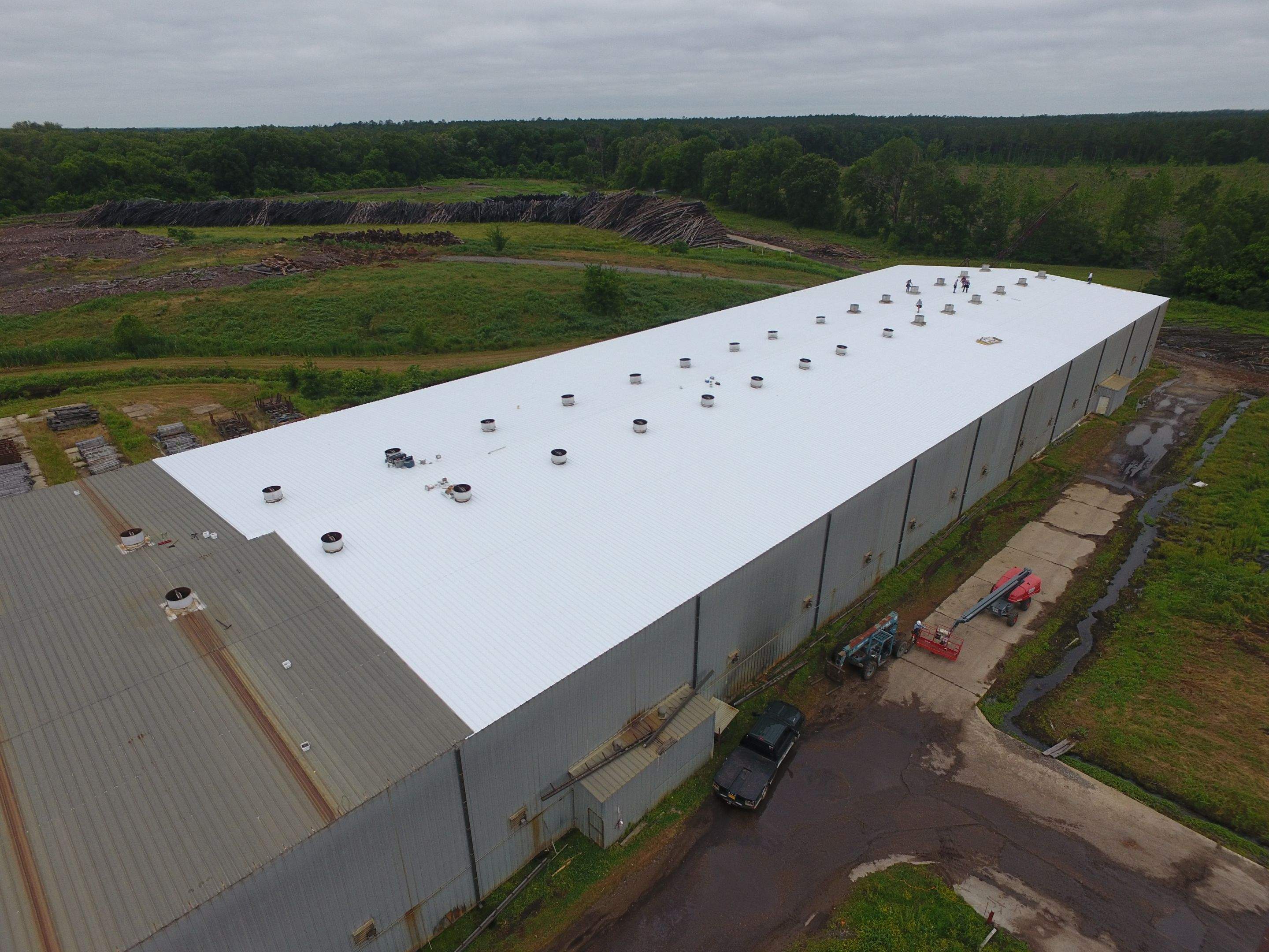 Commercial Roofing Installation using Aluminum Roofing panels by Hostetler Roofing