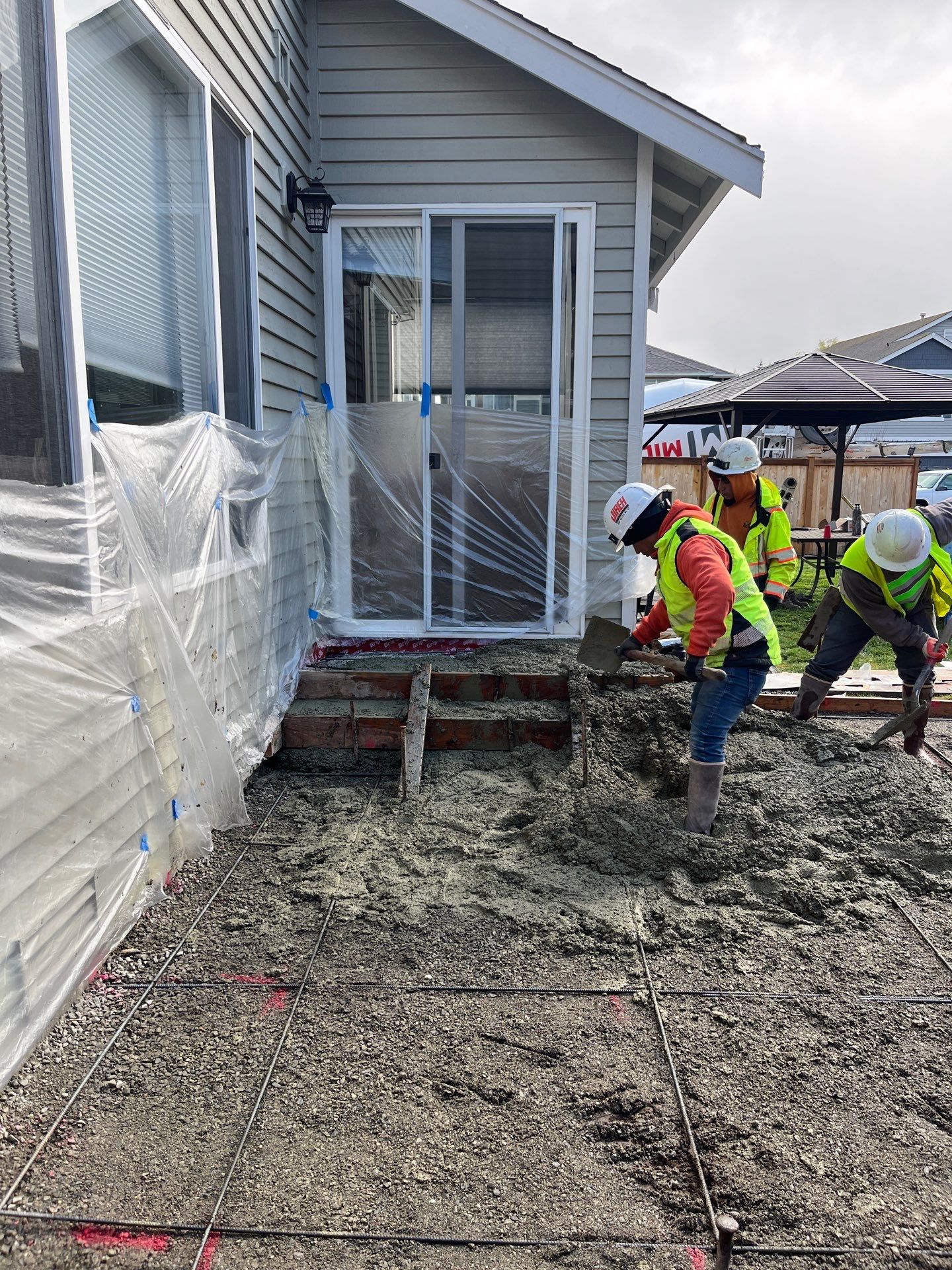 Benedict | Stamped Concrete Back Patio by Jireh Asphalt & Concrete Inc 