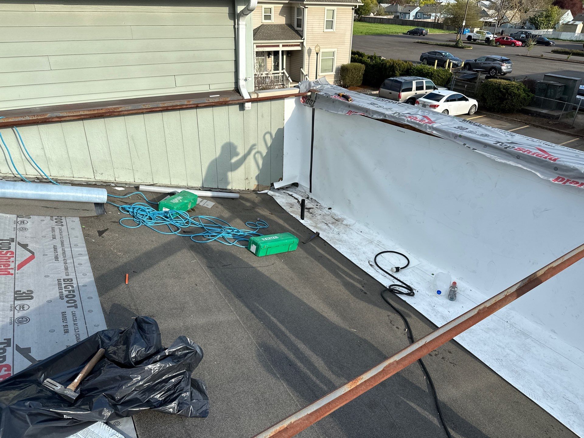 Commercial Roofing Installation using IKO Dynasty & GAF 60Mil TPO by Orezona Building & Roofing Company, Inc.