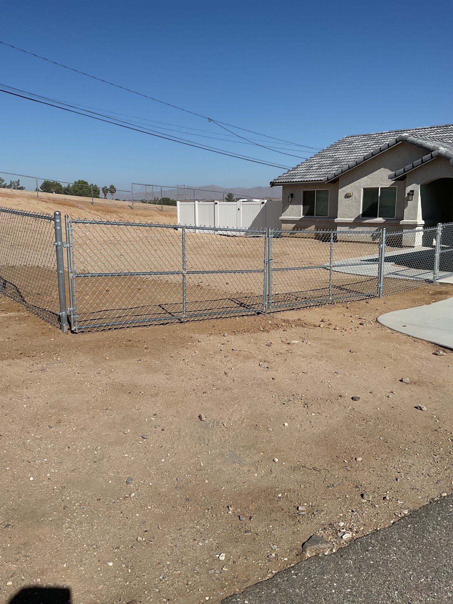 Fence Installation using chain -link by Fence Guys Inc.