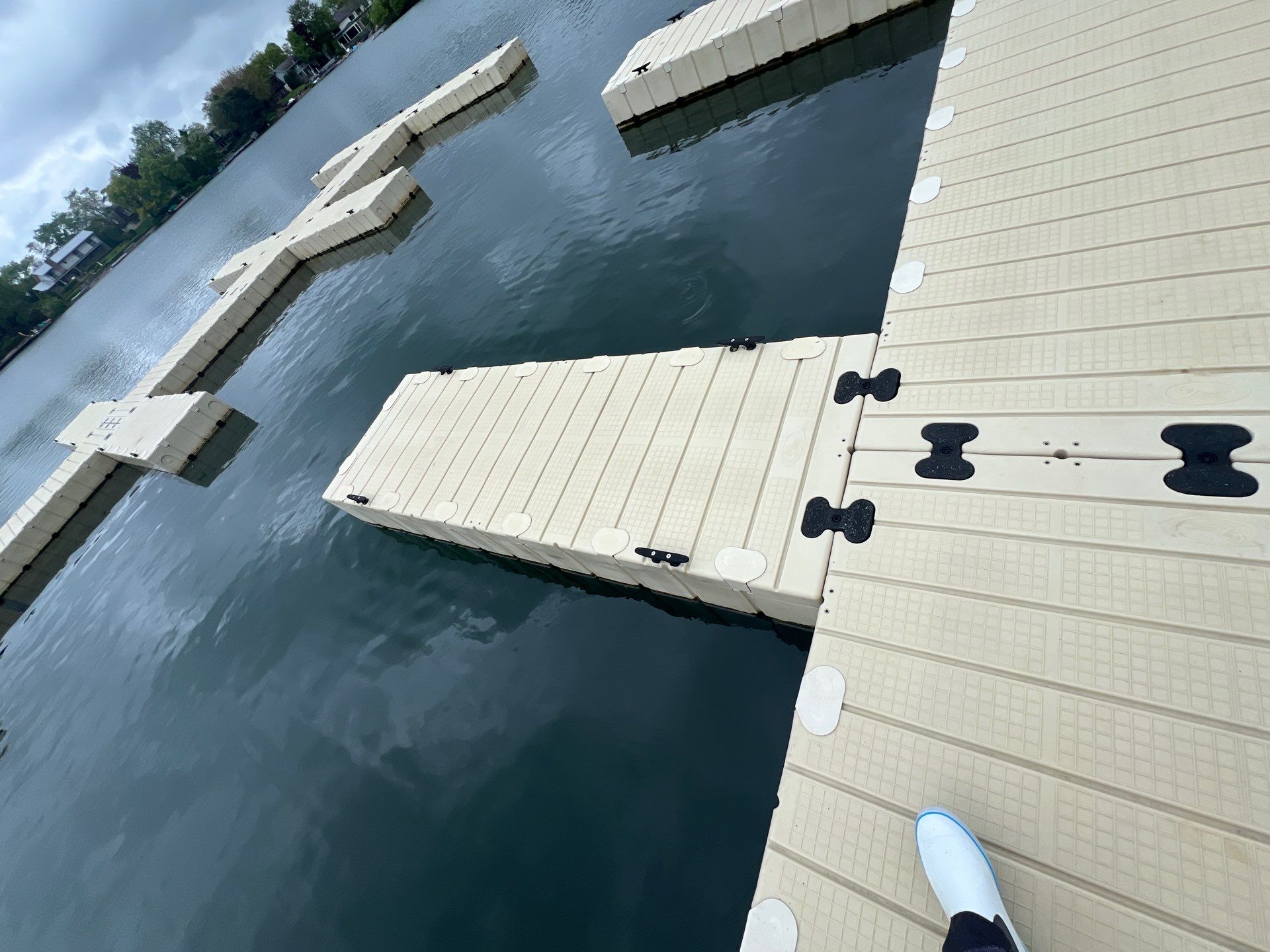 Power washing of floating dock by Northern Power Washing LLC.