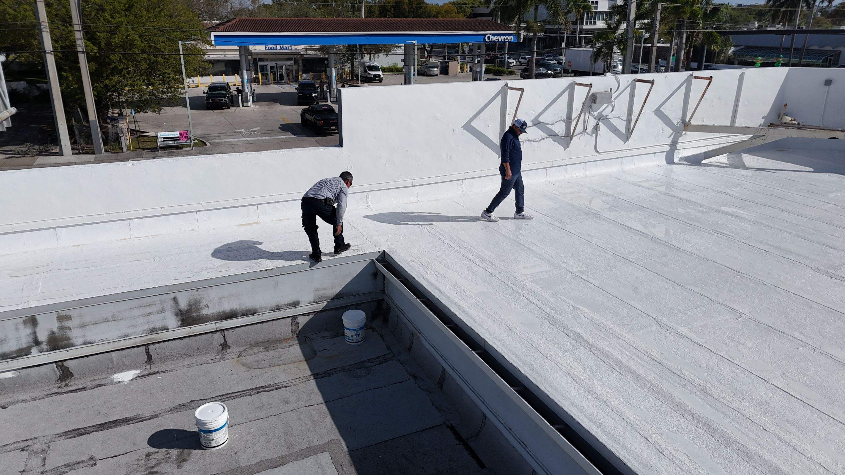 Commercial Flat Roof Restoration Using Silicone Coating in Hallandale Beach by Aastro Roofing