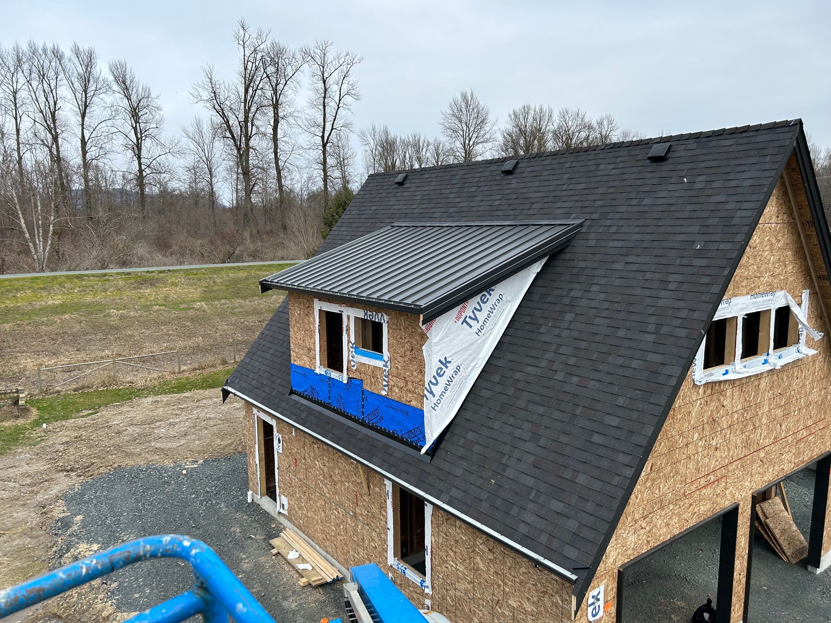 Residential Roofing Installation using Malarky Vista Shingles and Prolok Metal  by Top Notch Roofing Inc